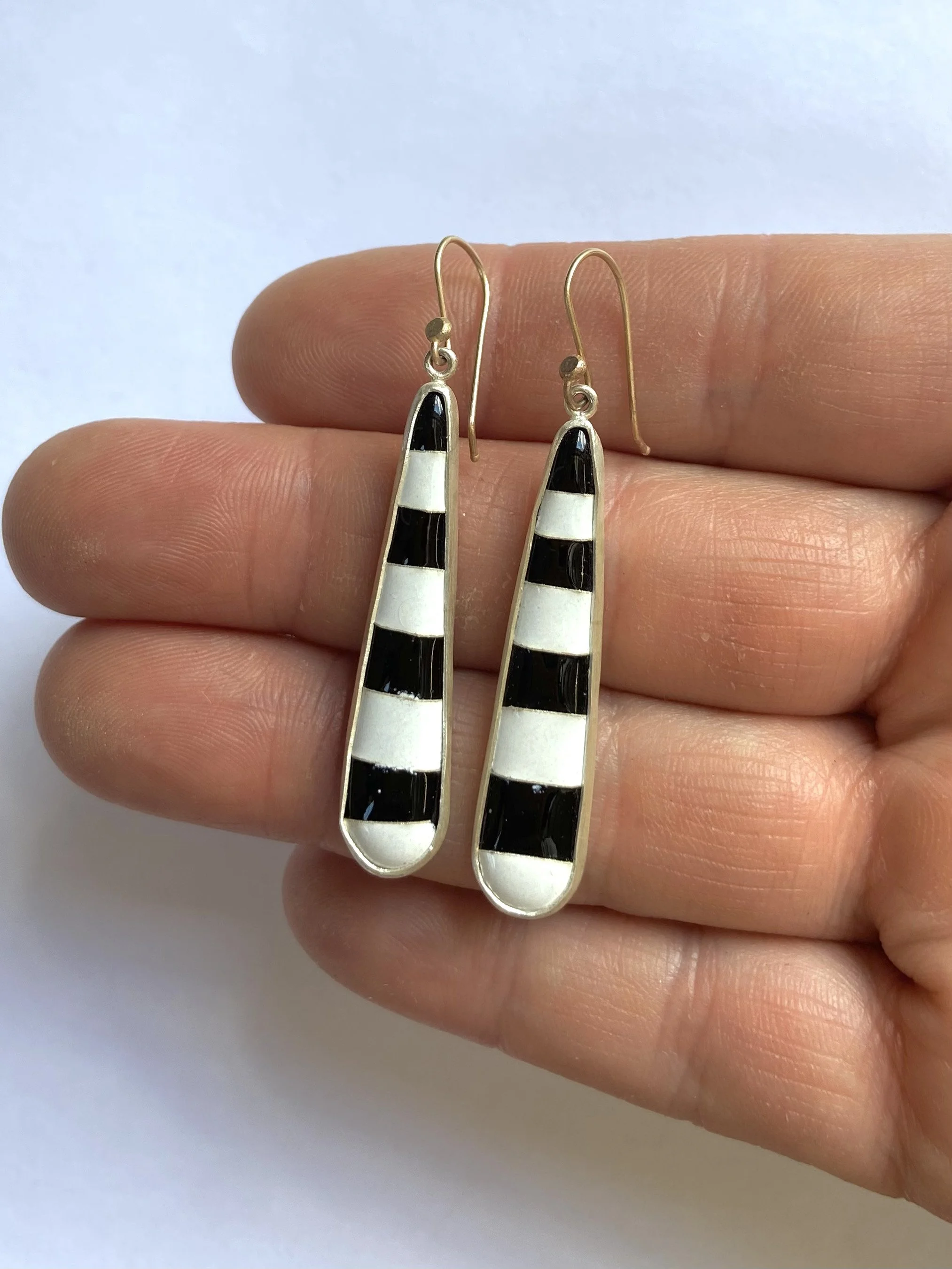 black white stripe earrings hand.jpg