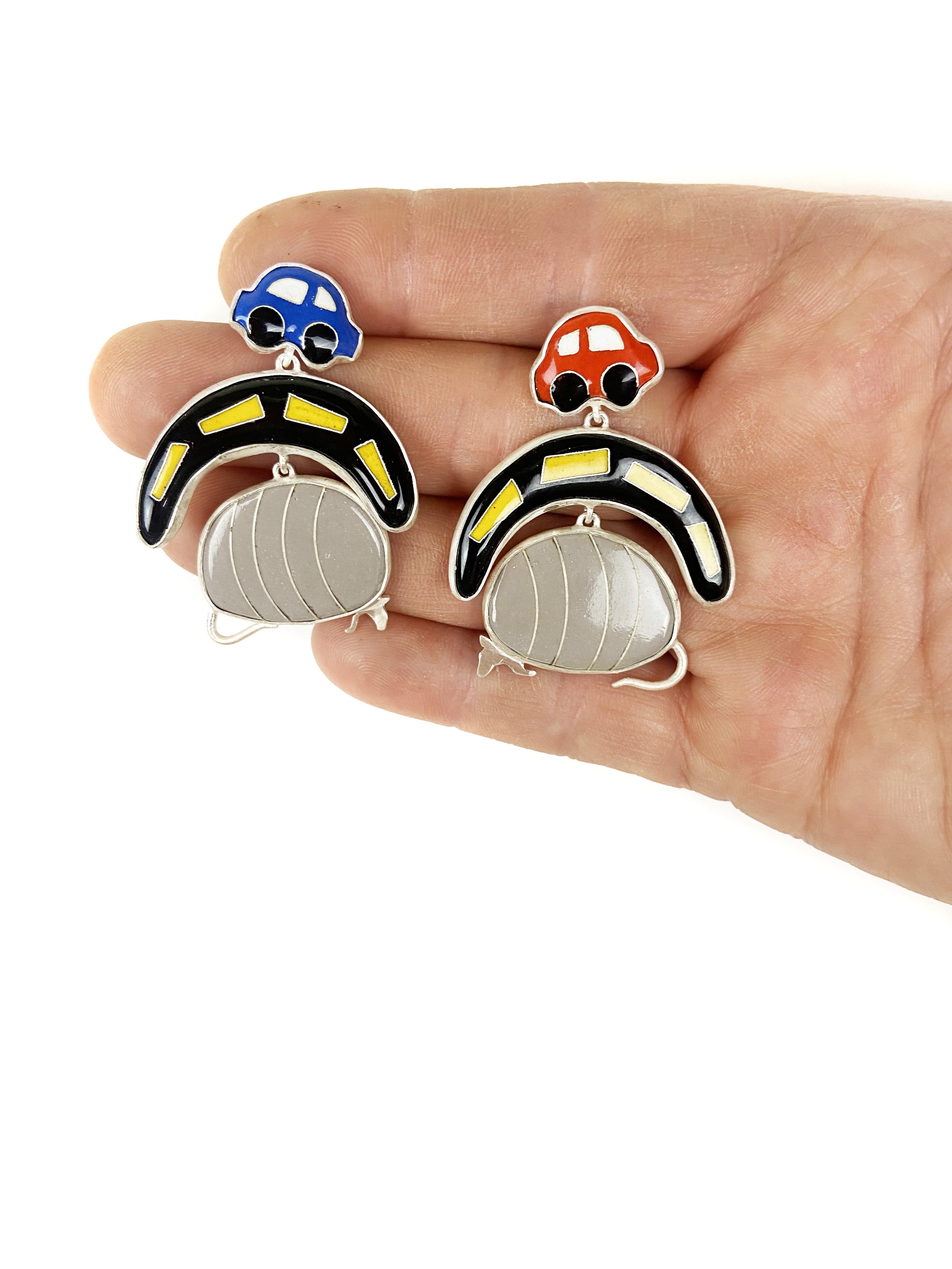 RoadKill Earrings Hand.jpg