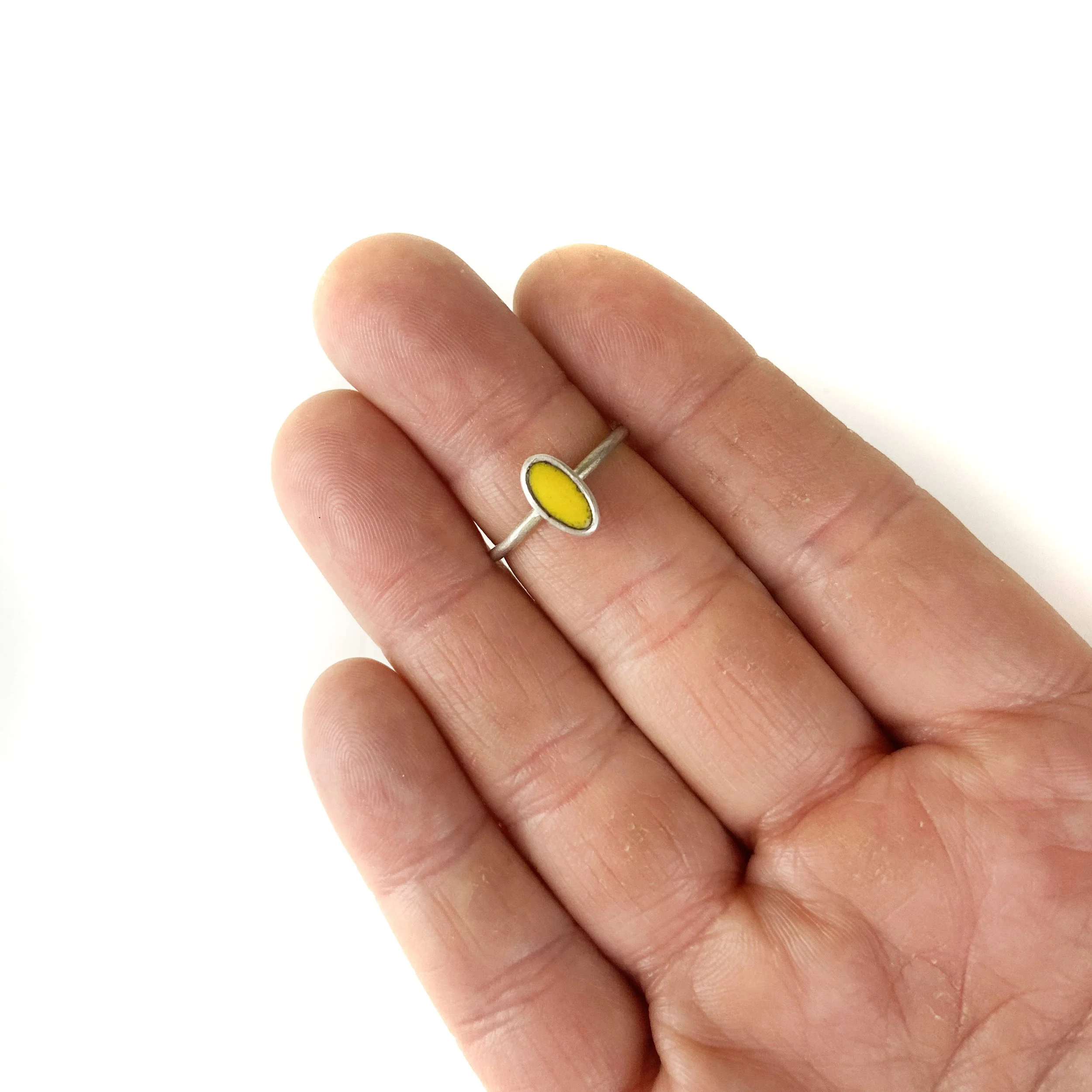 yellow ring oval hand.jpg