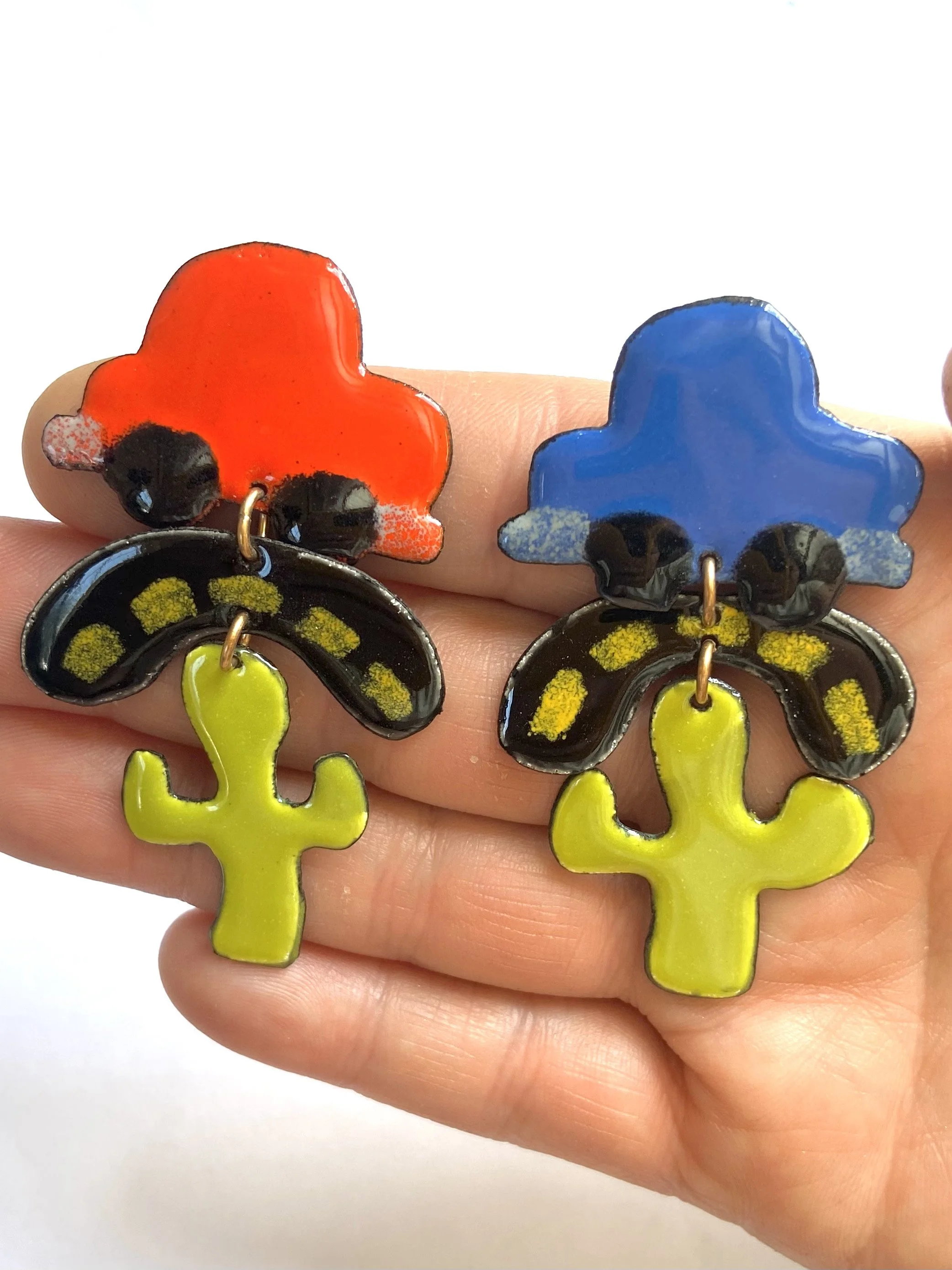 Car Cactus earrings hand.jpg