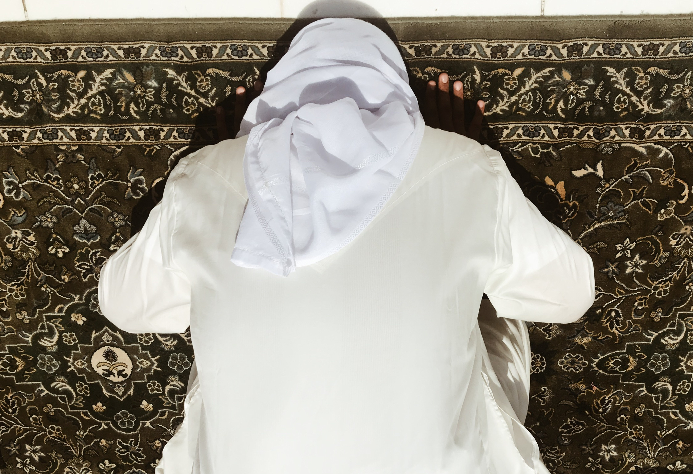 If you could not make it inside for prayer (or any of the five daily prayers), you have no choice but to pray outside in the heat. If you are lucky, you secure a spot with carpet already laid out.
