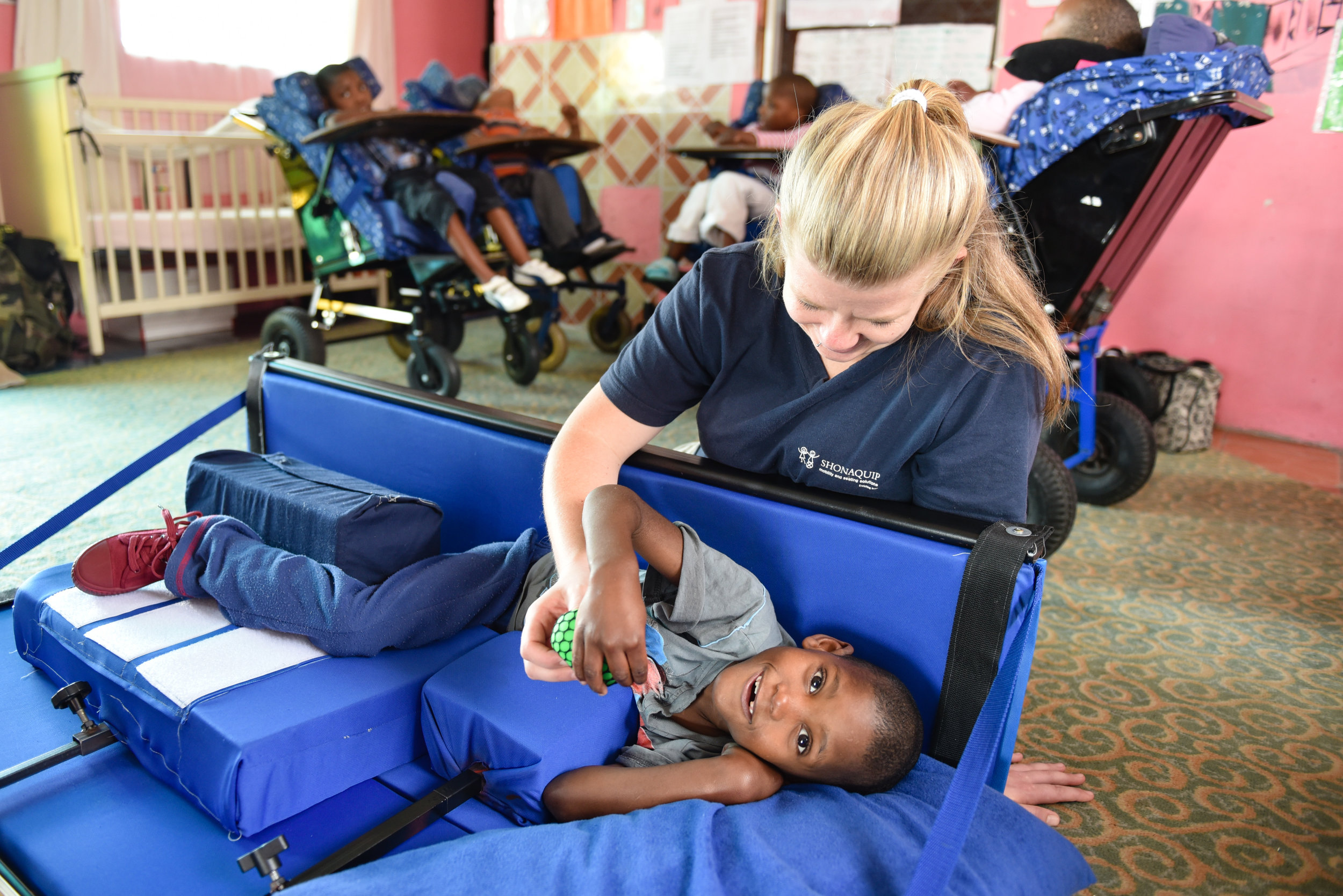 A caregiver tests a later prototype in Capetown.
