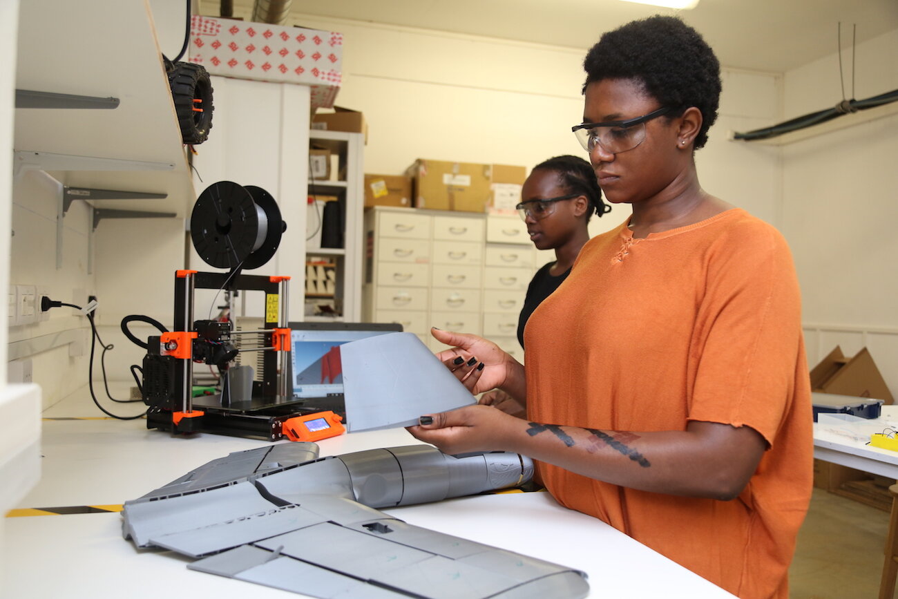  Students at African Leadership University (ALU) in Rwanda and Mauritius declare missions, not majors and wrap their course of study around them. Here, ALU students work on a drone-building project in the Engineering Lab. 