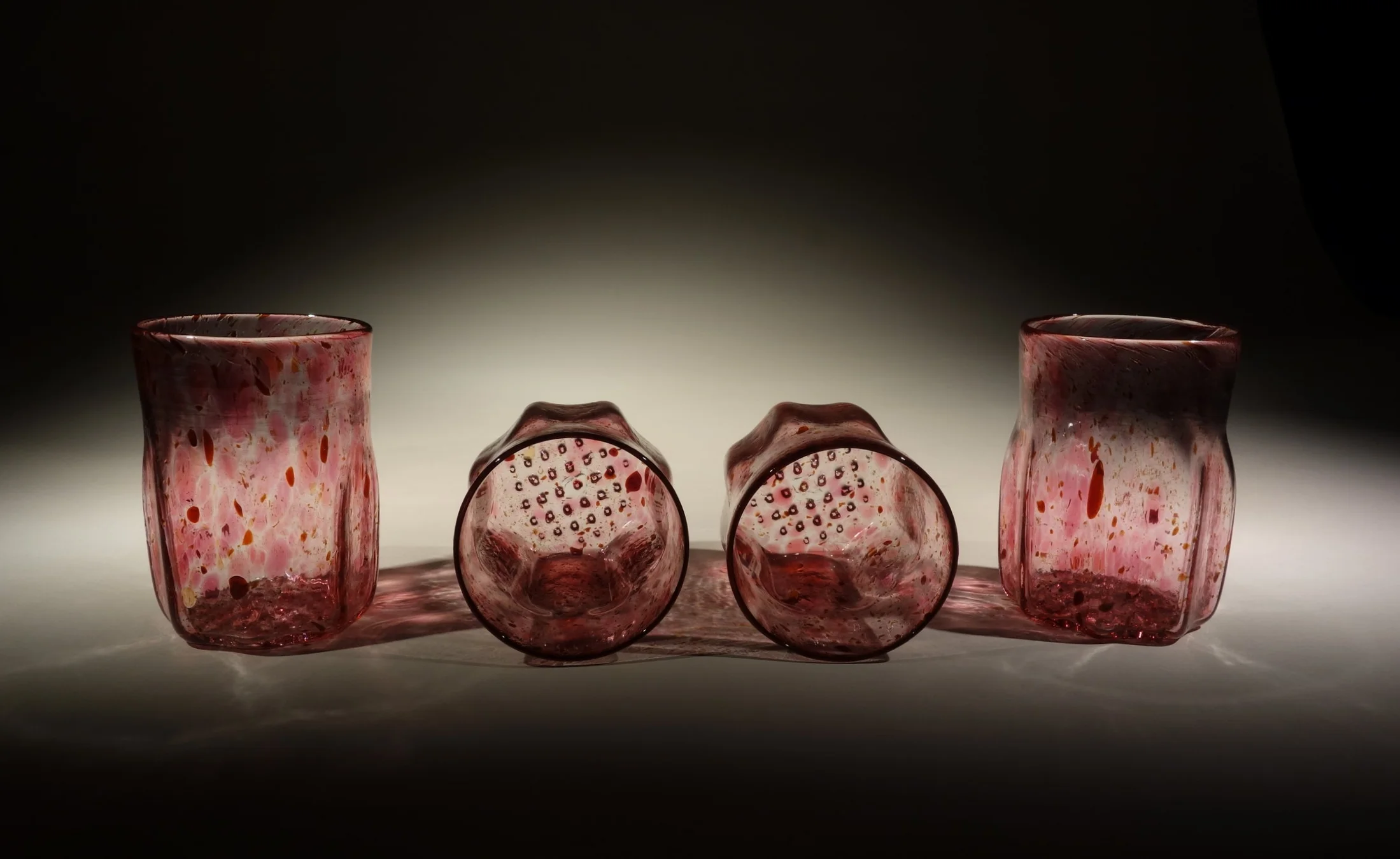 A set of four with the optic Base exposed