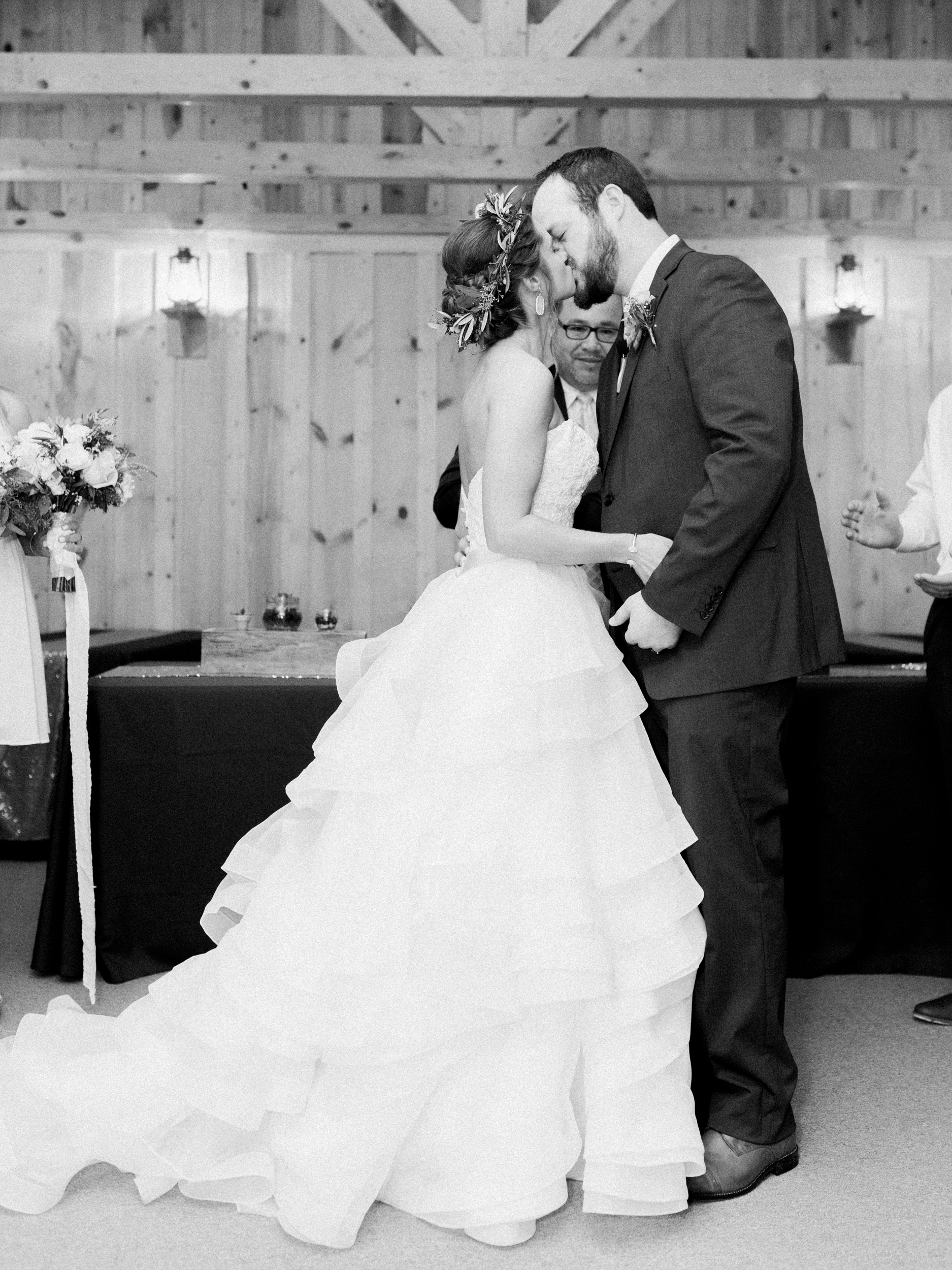 Hill Country Spring Wedding at Red Bud Hall | Austin Wedding Photographer | Film Wedding Photographer | Britni Dean Photography | Rainy Day Wedding Inspiration | bride and groom first kiss