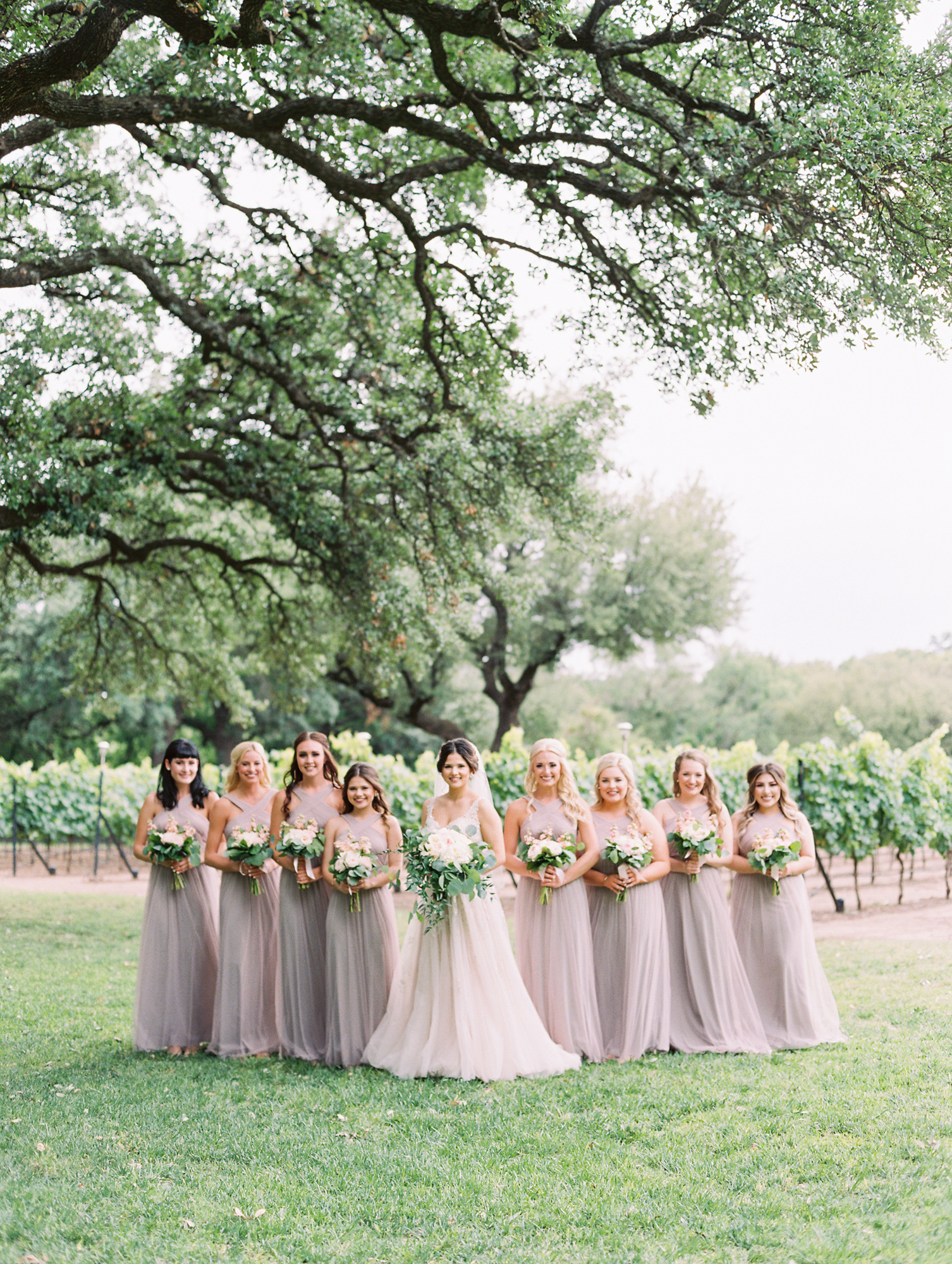 Elegant Spring Vineyard Wedding | Film Wedding Photographer | Austin Wedding Photographer | Romantic Taupe Bridesmaid Dresses, Flowy Bridal Bouquet | Britni Dean Photography // britnidean.com