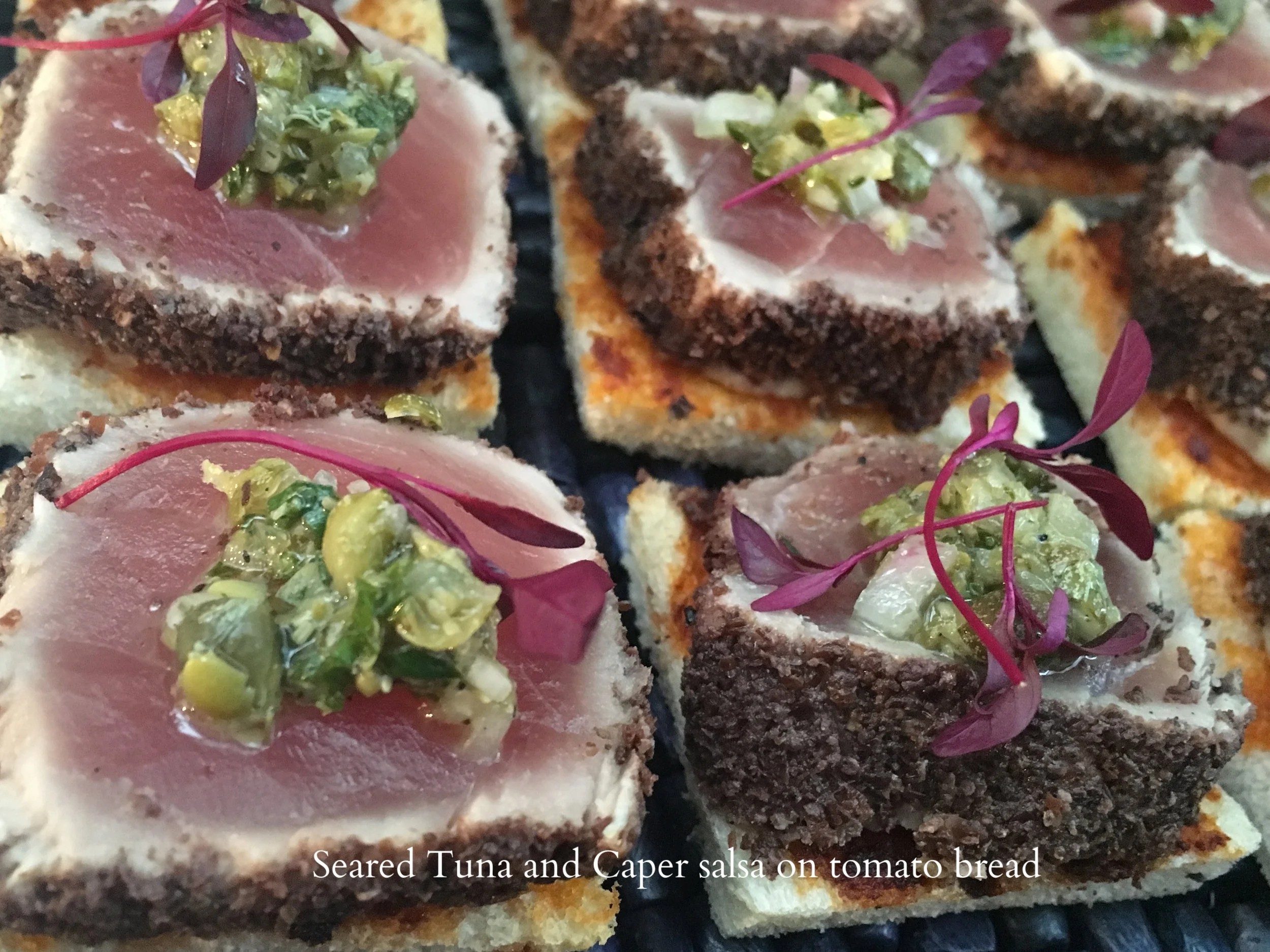 Seared Tuna and Caper salsa on tomato bread.jpg