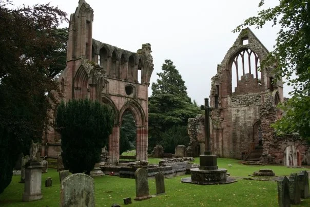 Dryburgh Abbey, Scotland, former home to the Premonstratensian order of canons/priests. Though now in ruins, the building and grounds were awe-inspiring and eerie to visit.