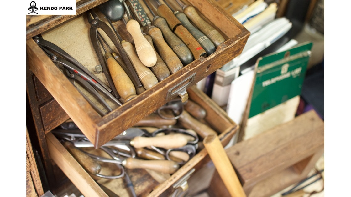 (Great amount of tools arranged in the workshop).