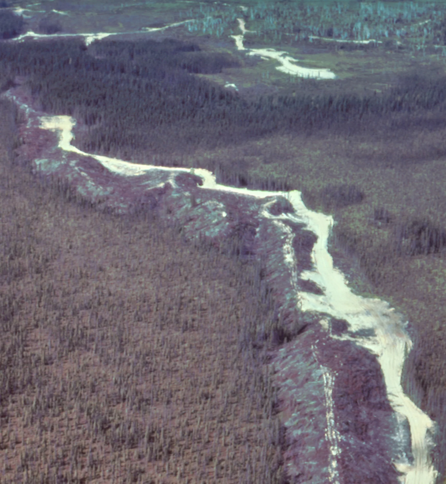 Figure 5: An esker south of Timmins, Ontario, is being used as a source of road construction material. Photo by Cam Baker, formerly of Ontario Geological Survey.