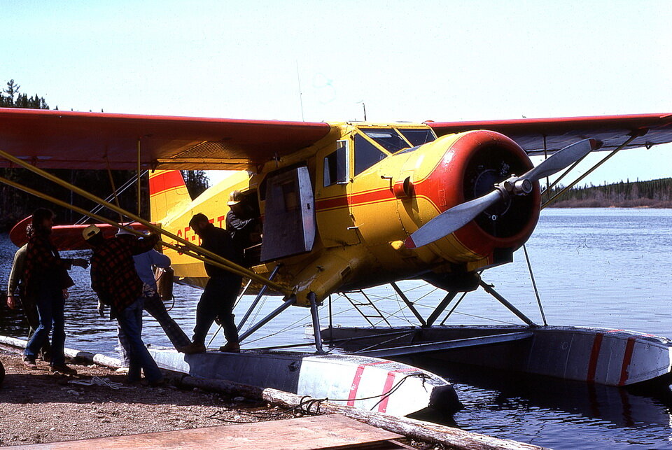Loading the Norseman aircraft in preparation for our flight to a remote area where we would set up a bush tent camp in northwestern Ontario, Canada. This was the summer of 1976.