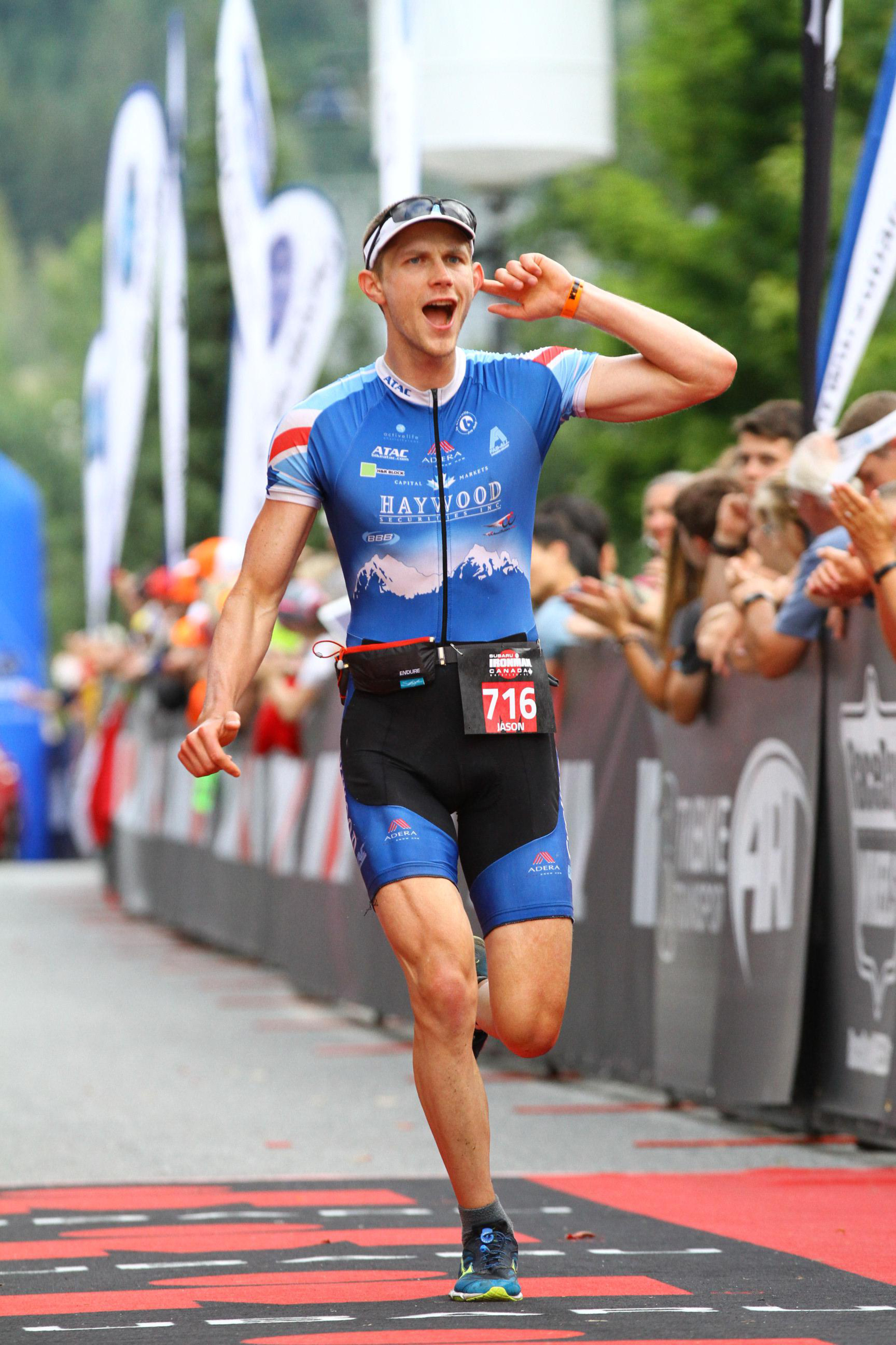 Running to the finish line of my first Ironman. Thanks to FinisherPix for the awesome photo. 