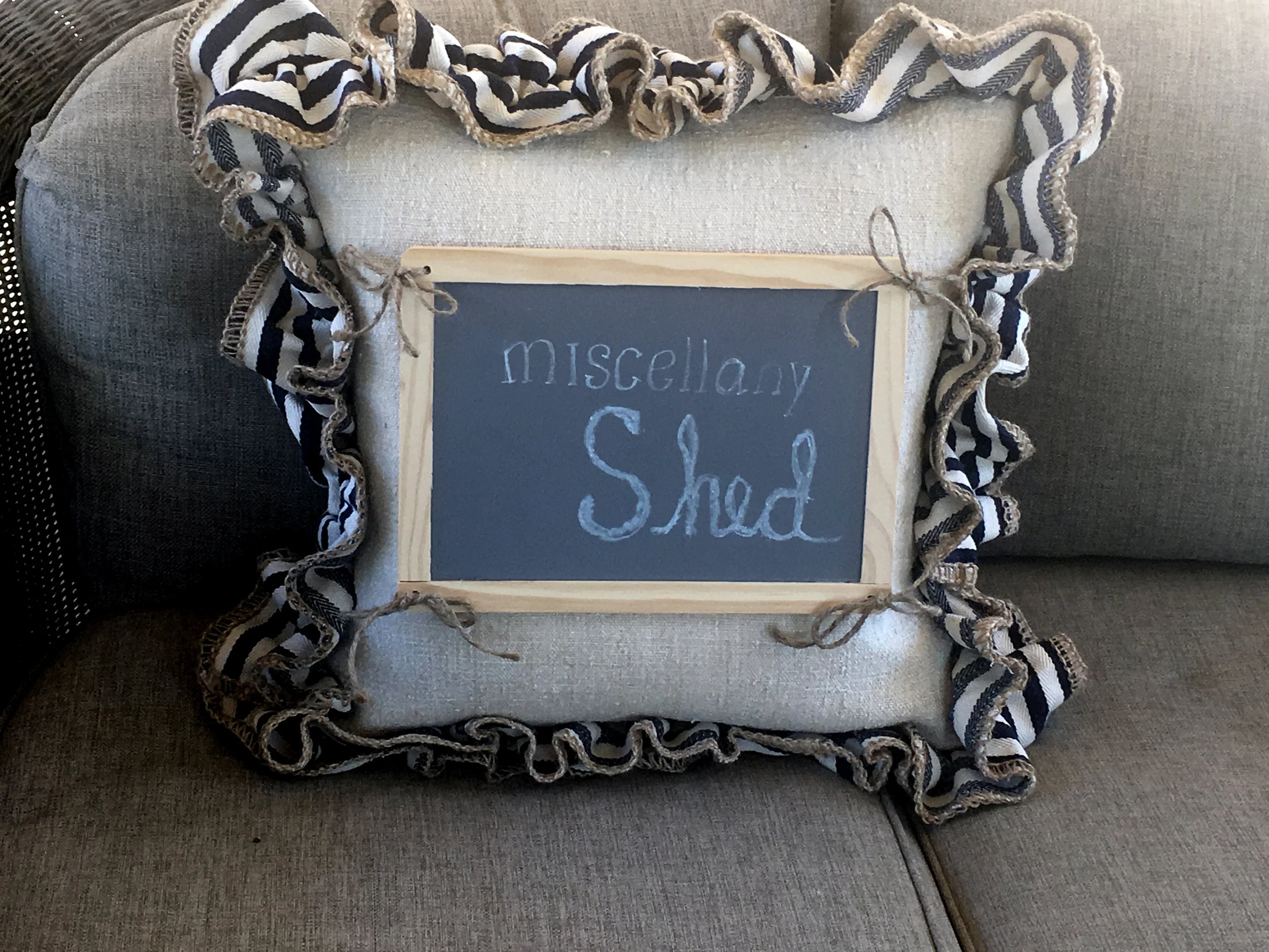 Added to the Chalkboard Collection: gorgeous feed-sack pillow with burlap ribbon trim and an adorable chalkboard sign attached right in the center!