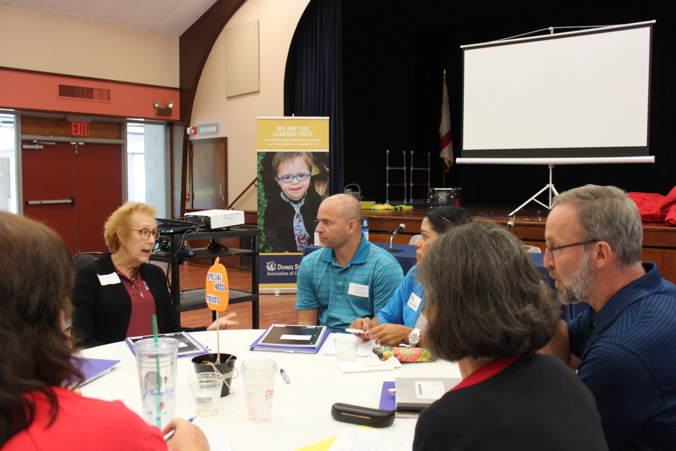 Attorney Lynn Aust answers questions about Special Needs Trusts at one of the roundtable discussion sessions.