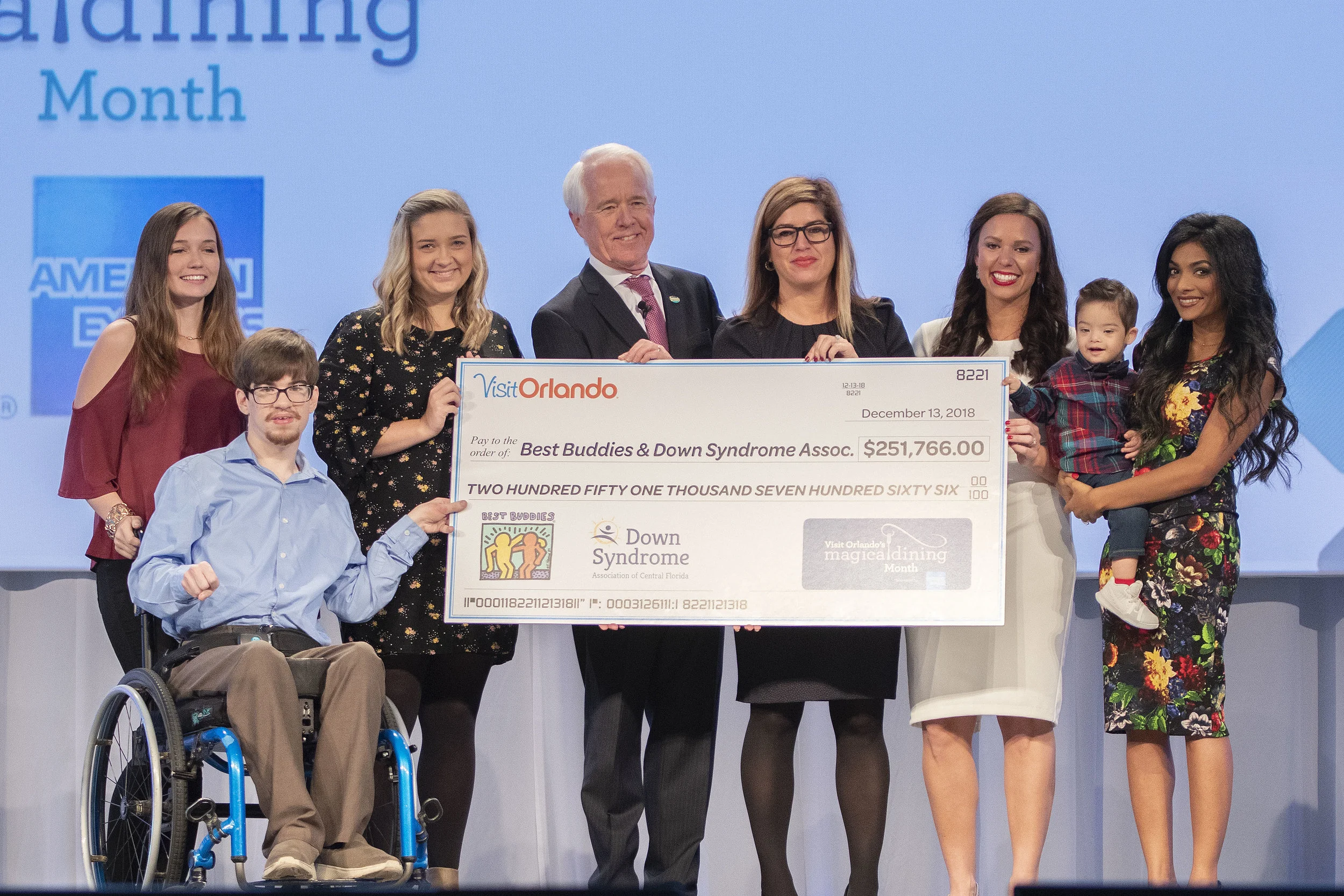 Photo Caption: Best Buddies ambassadors Seaira Sevison and Travis Morgan; Emily Hunt, director of state operations, Best Buddies Florida; Don Engfer, Visit Orlando Board Chair; Joanne Marsal Vassos, American Express; Amy Drow, development manager, Down Syndrome Association of Central Florida; and Down Syndrome Association of Central Florida ambassadors Paige and Tristan McMillen. Image courtesy of Visit Orlando.