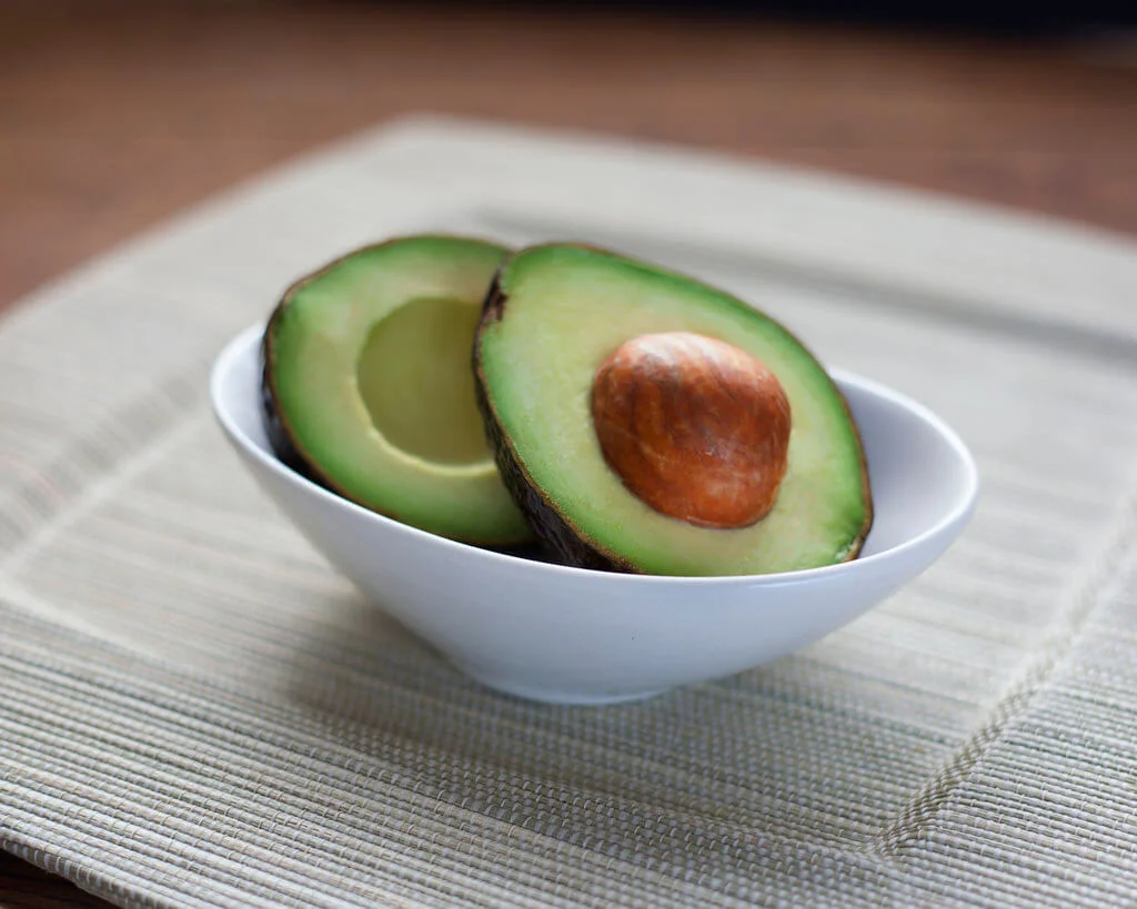 Sliced avocado in a bowl.