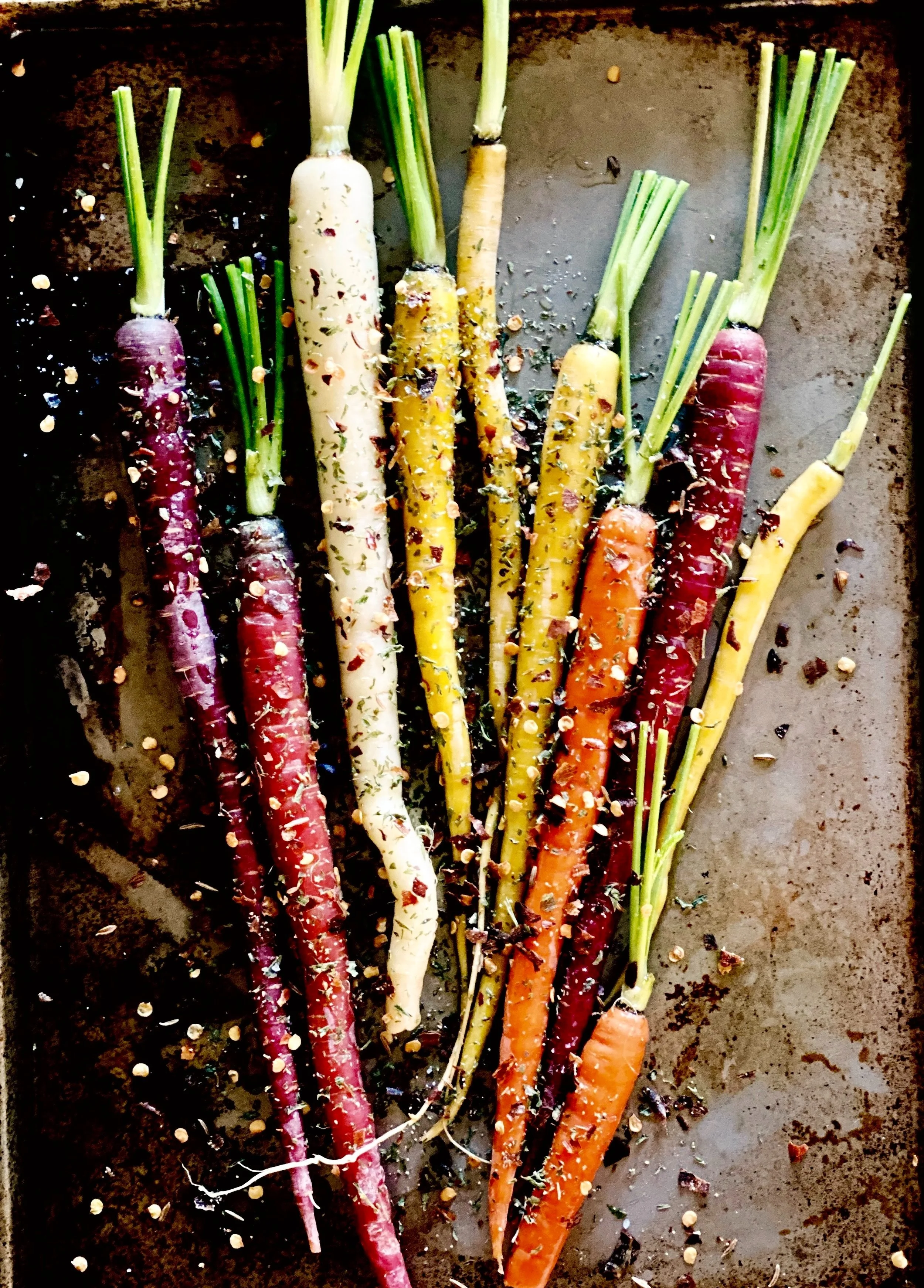 ROASTED CARROTS w/ HARISSA SPICES + CILANTRO MINT YOGURT SAUCE