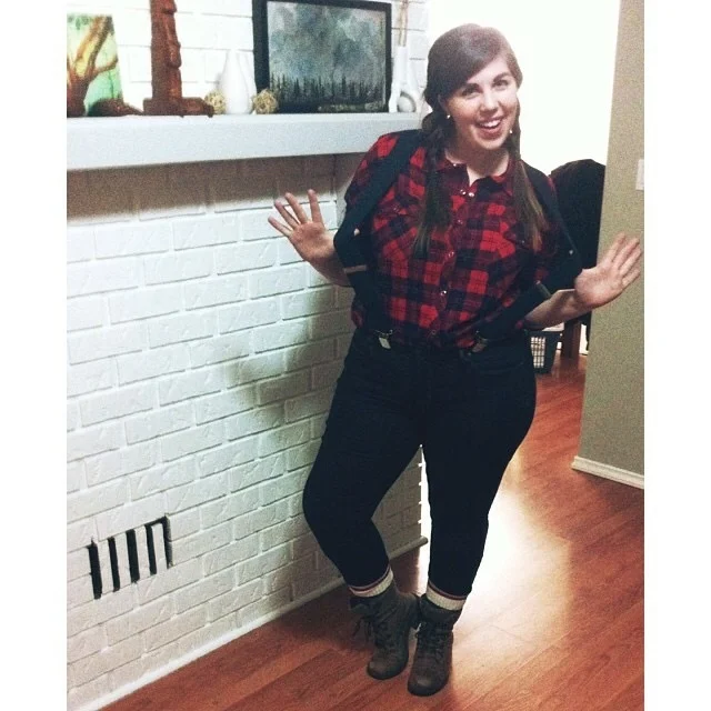 Lumber Jane Got a plaid shirt and boots? Perfect! Just hit up Walmart and pick up some suspenders and wooly socks. Instant lumber-babe. 