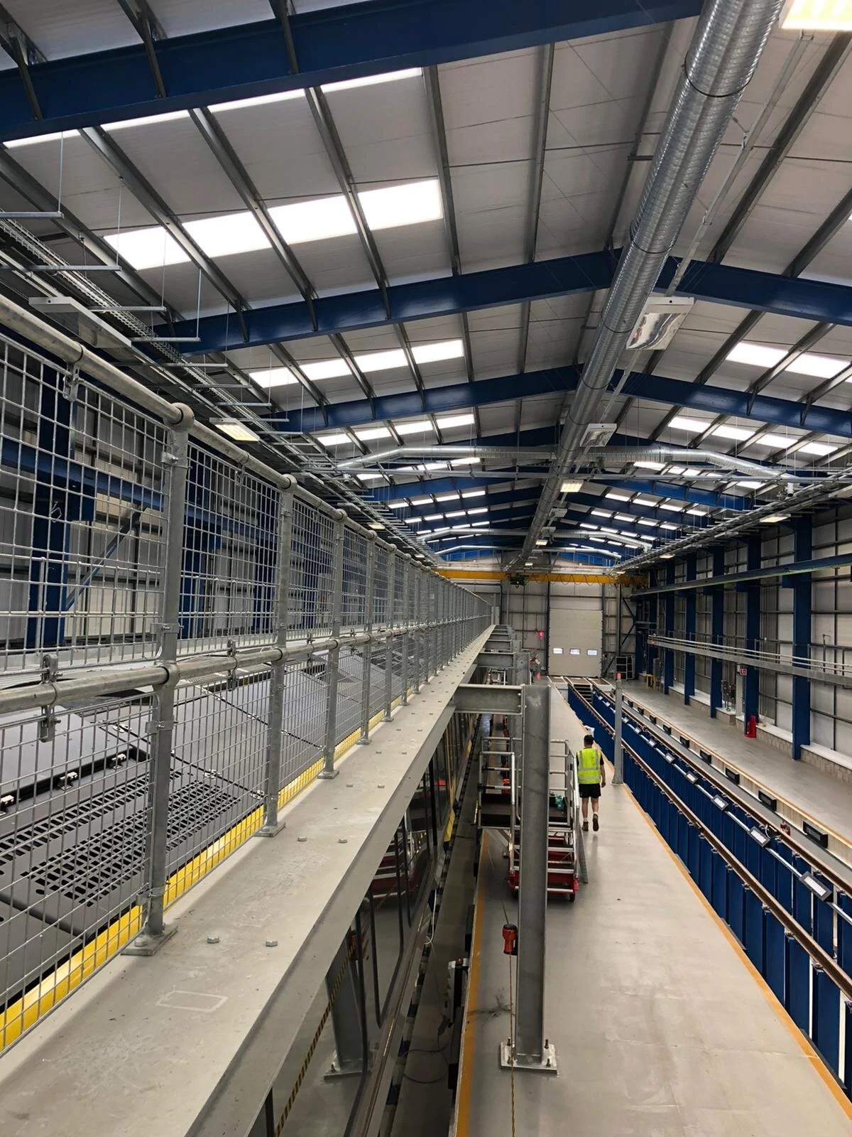 Gantry with added galvanised steel mesh netting .