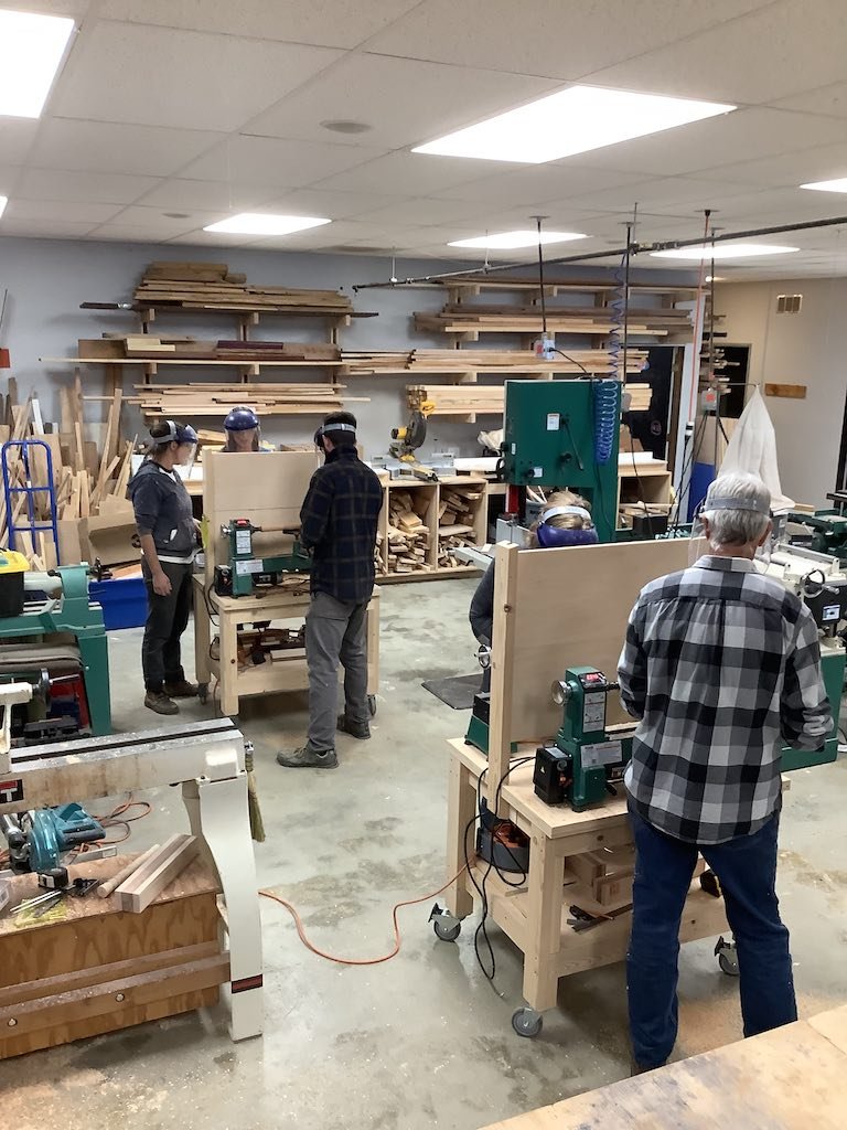 People at Talent Maker City woodshop working on the lathe (Copy) (Copy) (Copy)