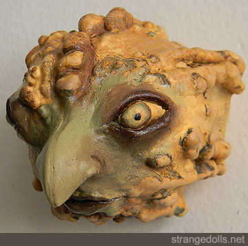 All of the heads are roughly 3" X 4" inches and are made to hang on the wall. They were made in 2012.
