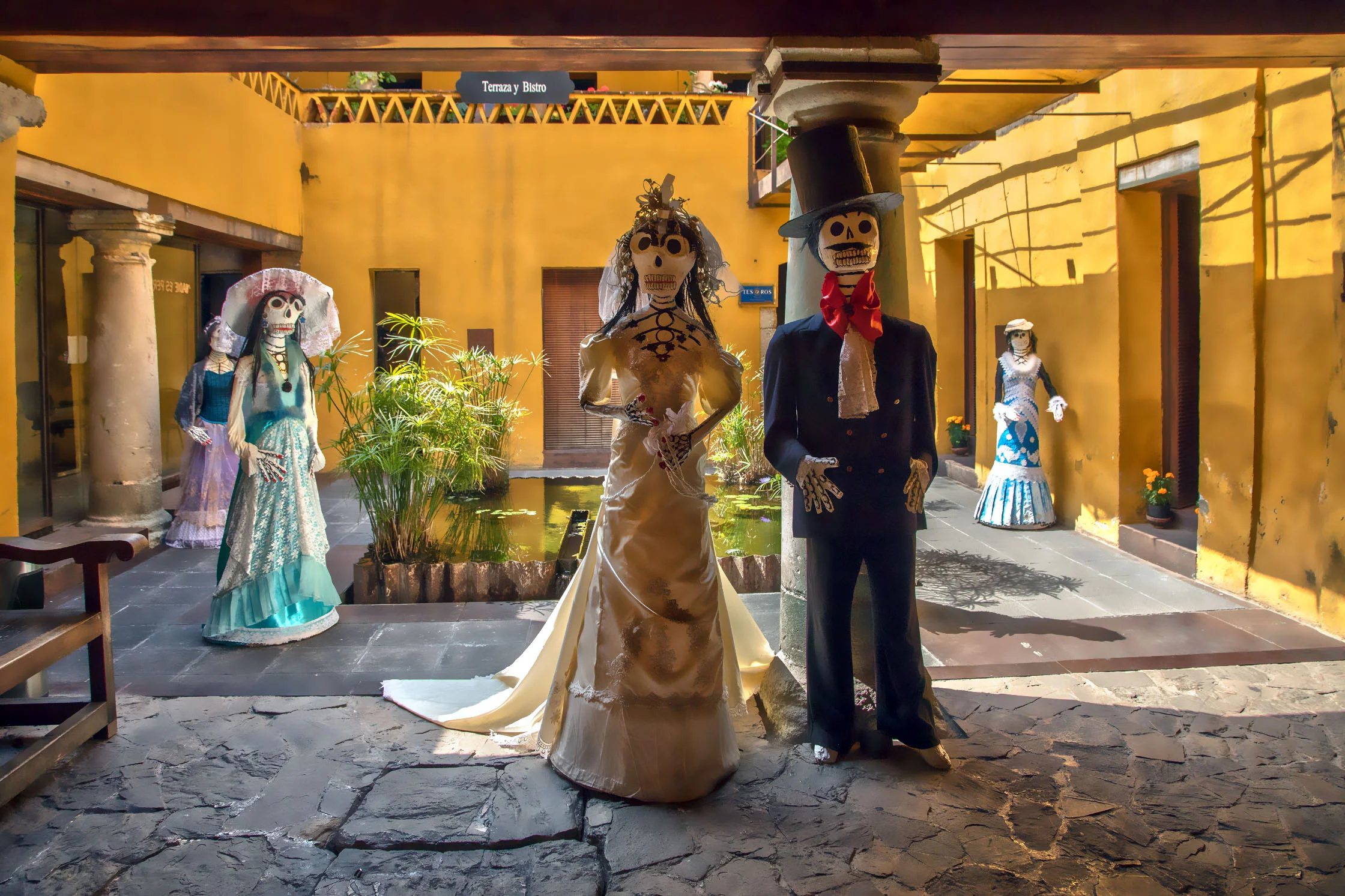 Wedding party with life-size figures.
