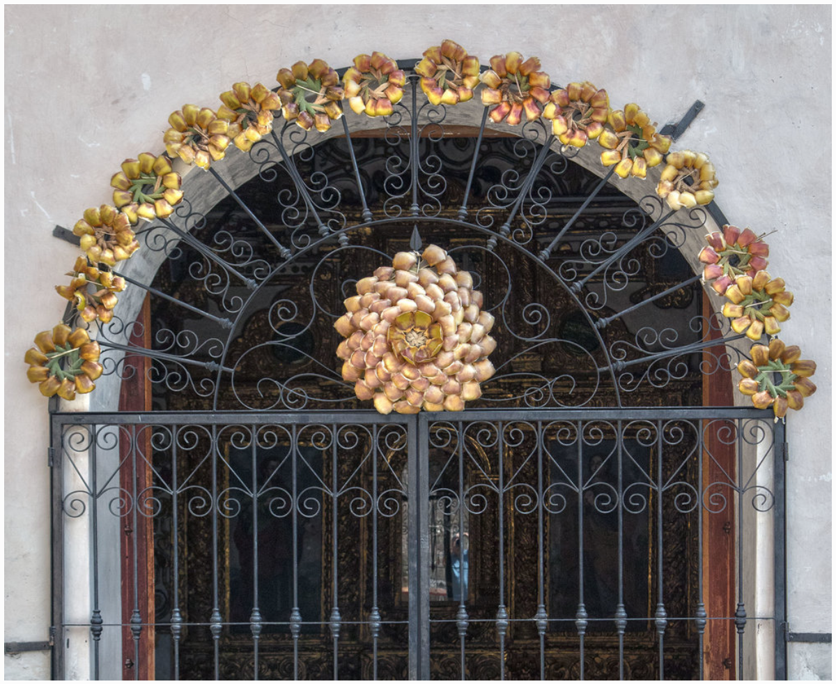 Palm leaf ornaments representing the sun and stars to honor the saints and returning souls.