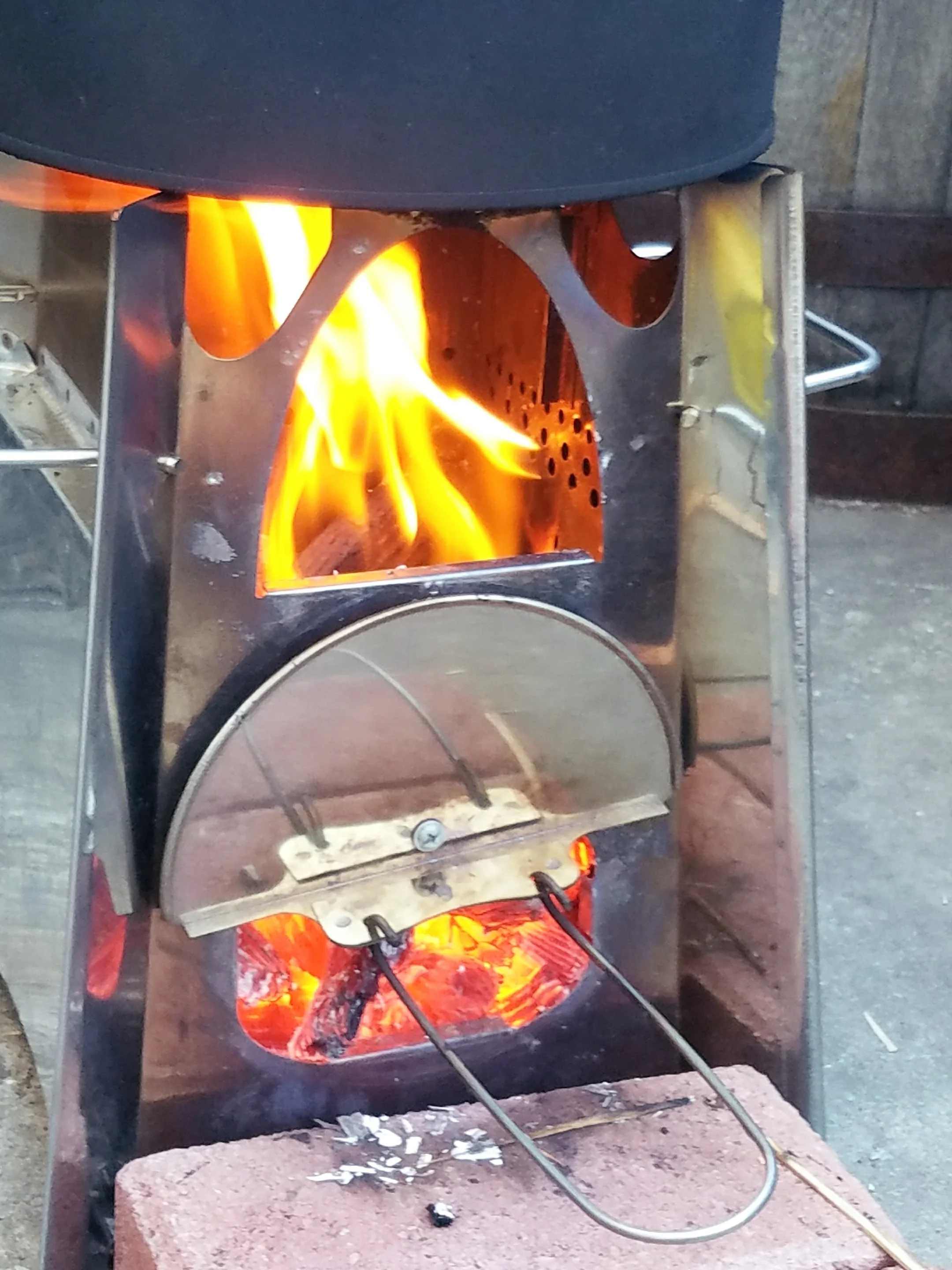 The $12 Ganesha stove in use