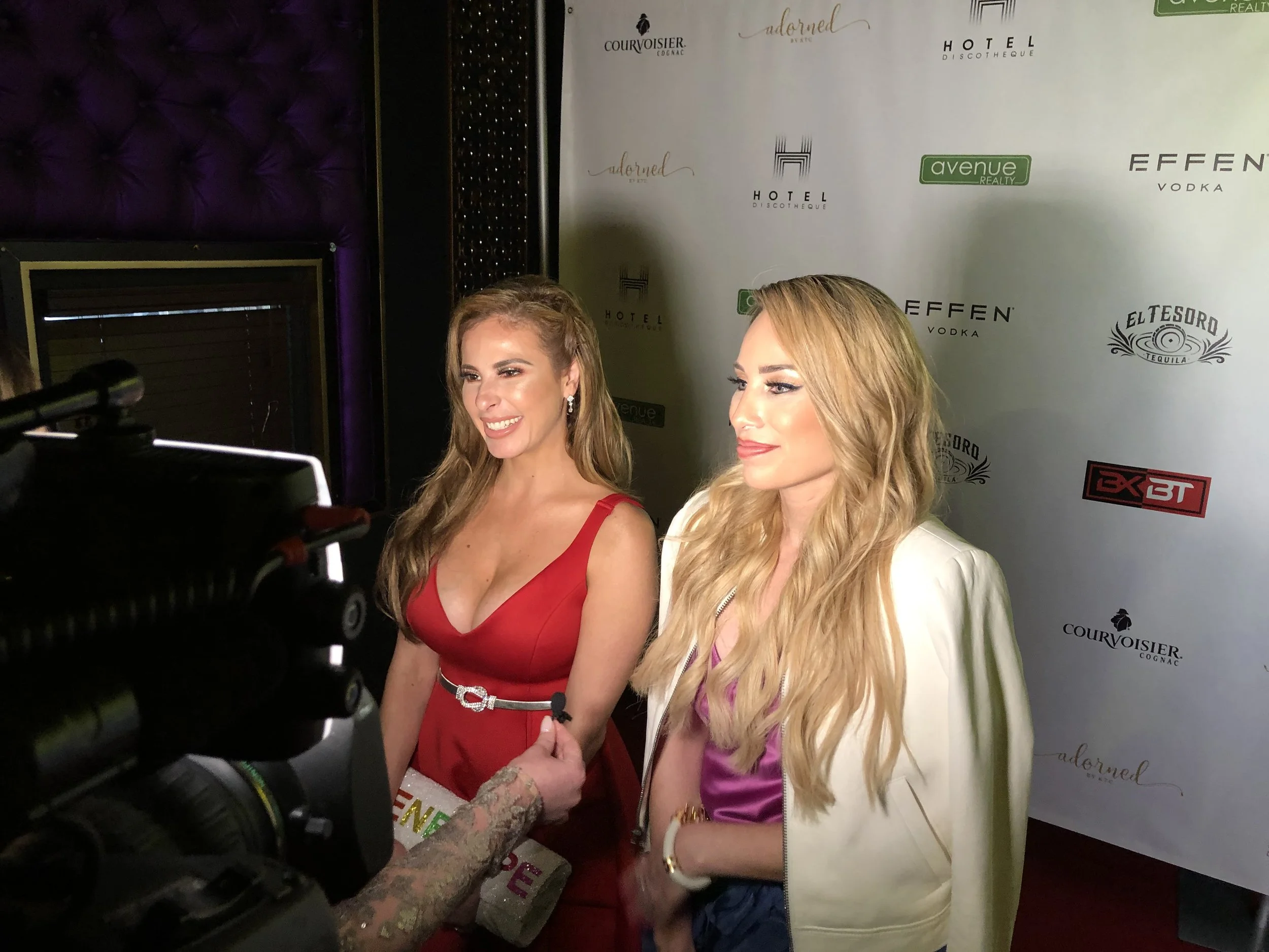 Penny Ayarzagoitia and Mayra Farrett being interviewed before the official premiere party.