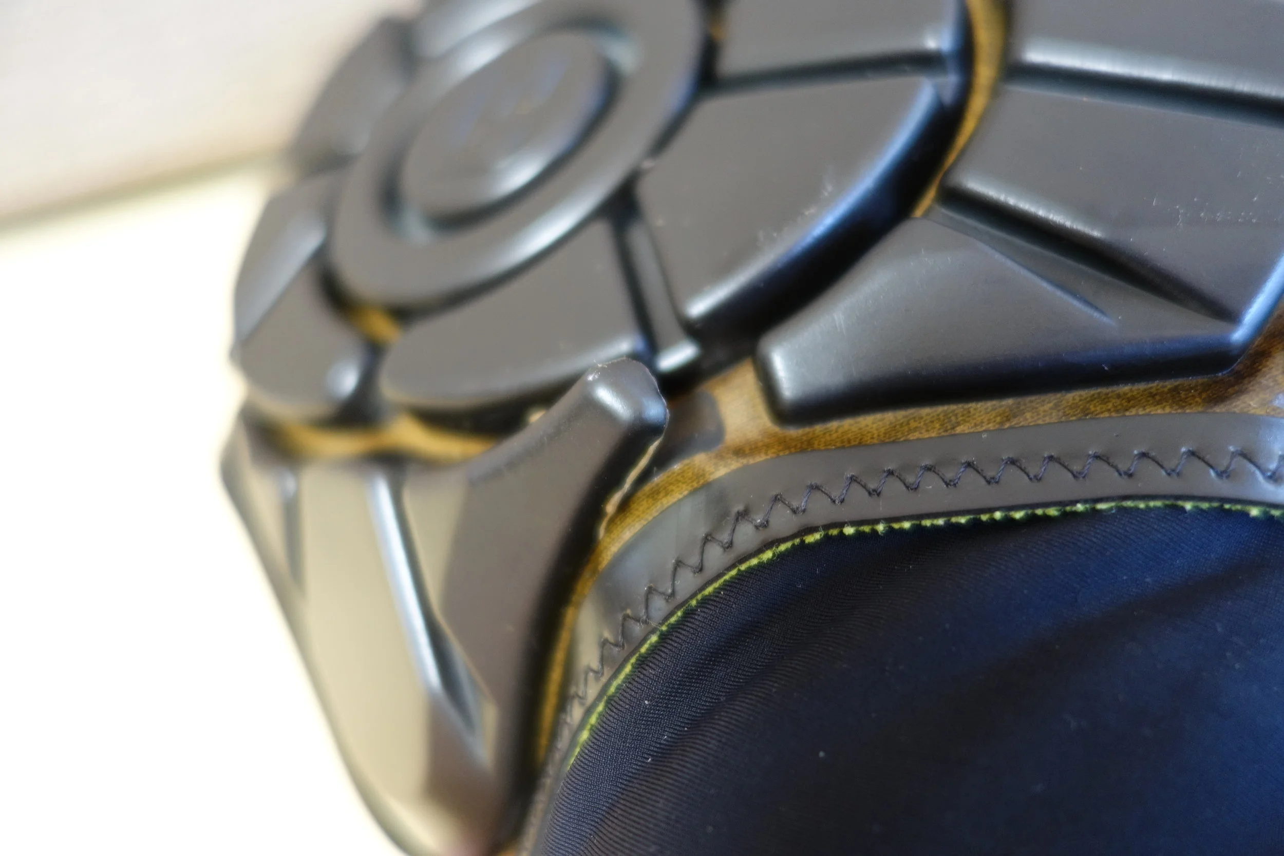 You can see where a corner is lifting. F2 type contact glue should fix that