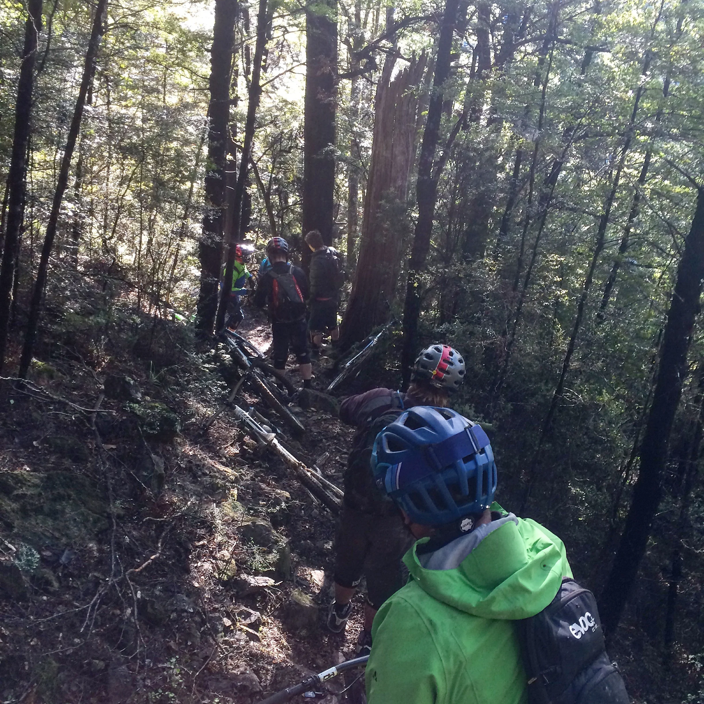 Man down. A snapped-off chin guard got us all thinking full-face helmets. Wairoa Gorge.