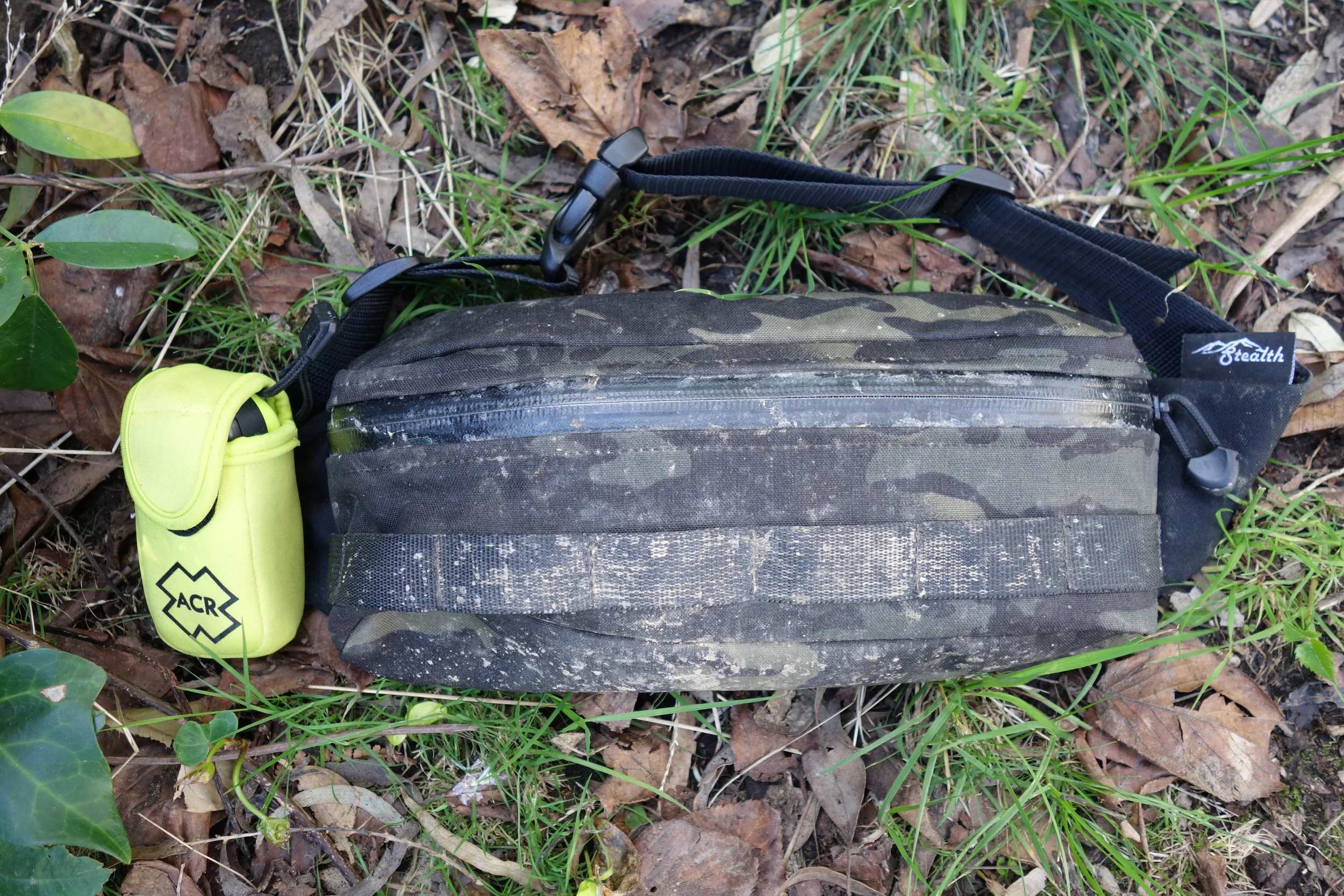It comes permanently attached into this little neoprene sleeve. It'll fit anywhere and I just loop it onto my Stealth Hipster Pack to give my riding buddies piece of mind.