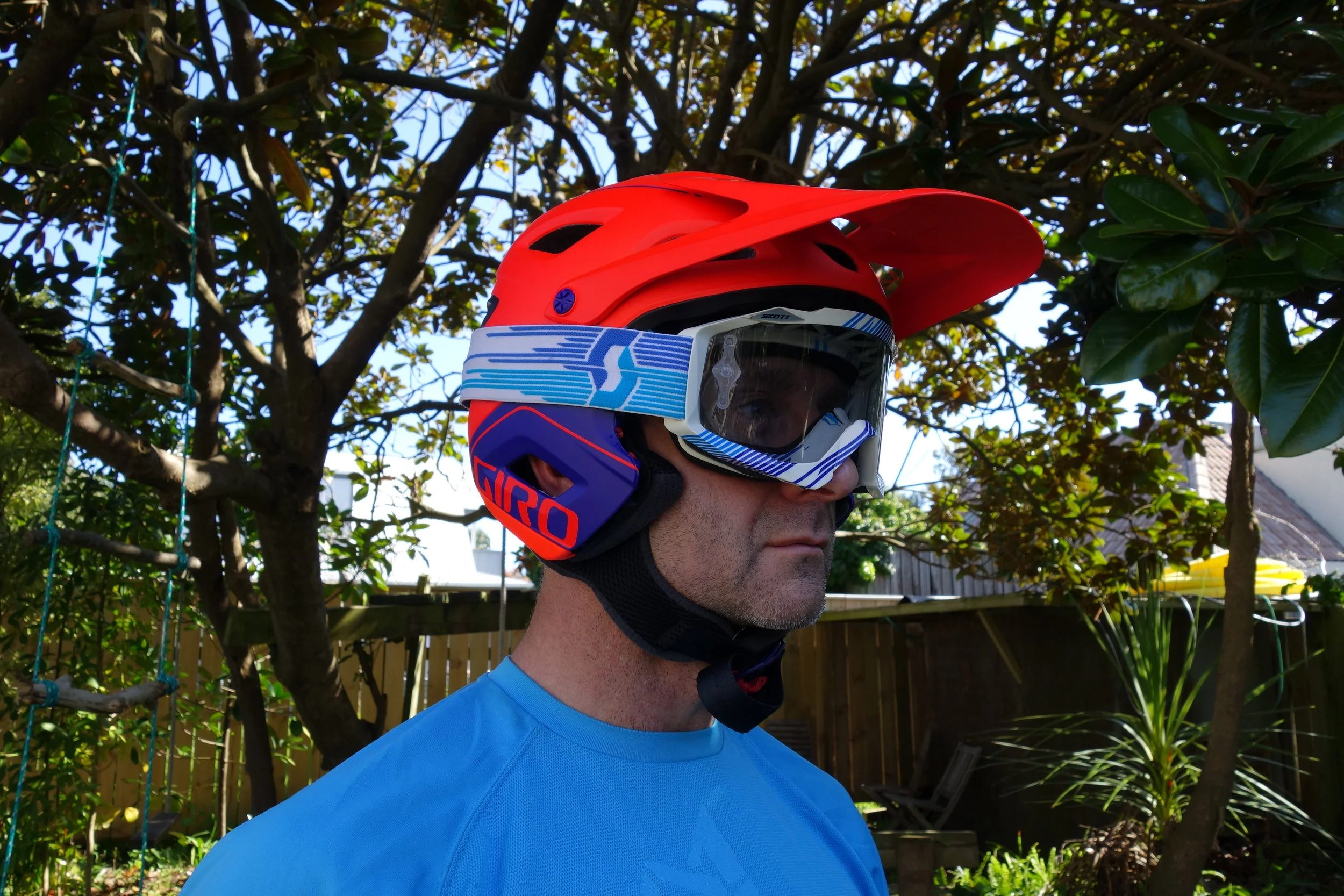 Finally a half shell helmet that looks good with goggles. you can see the padding that sits below the ear, they are small removable velcro pads, so if it's really hot it's possible to ride without them,just chuck them in your pocket for hot weather climbing, but the helmet won't be quite so snug.