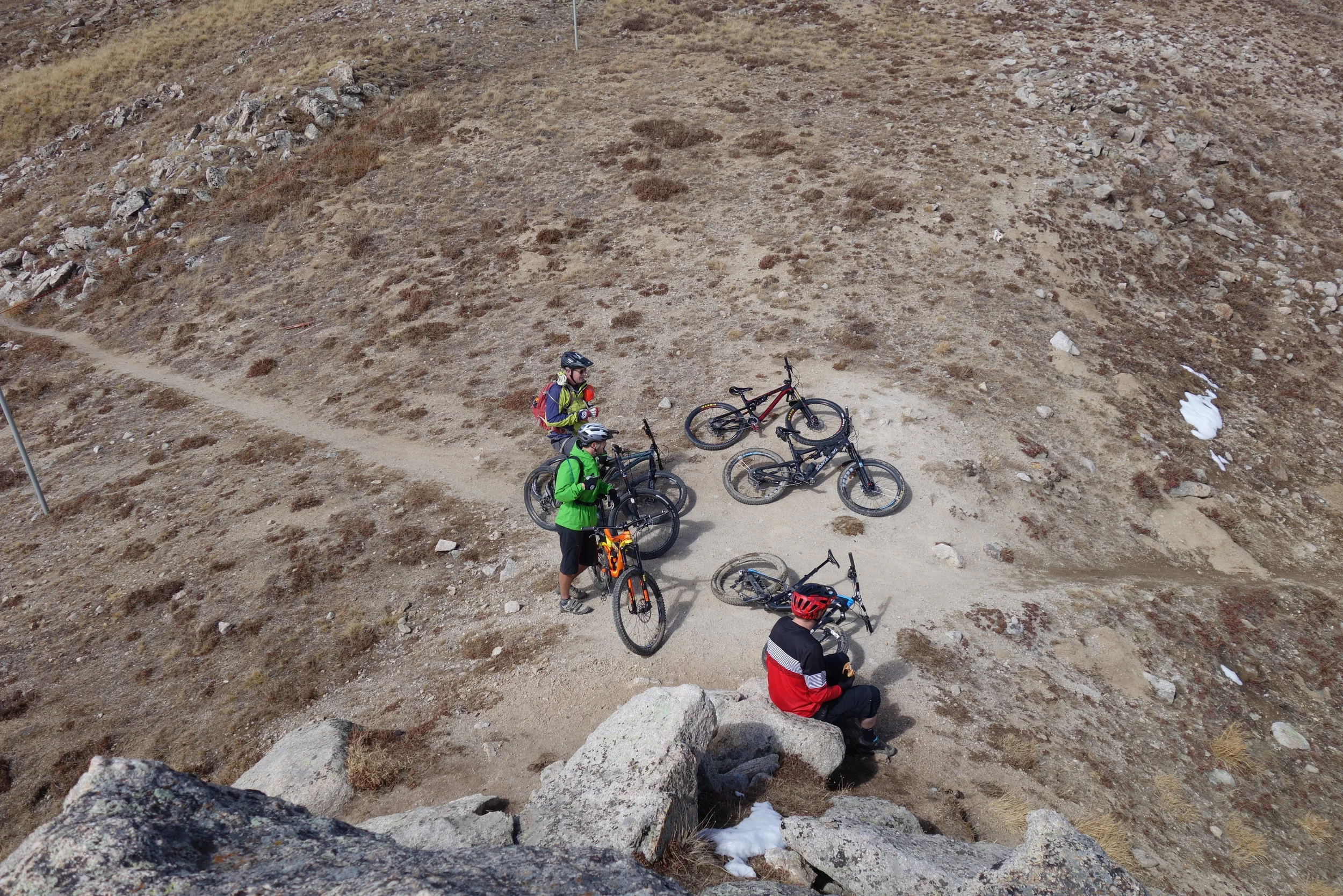 A quick snack at the top and take in the calm before the storm. There's about an hour of descending which puts a smile on everyone's faces