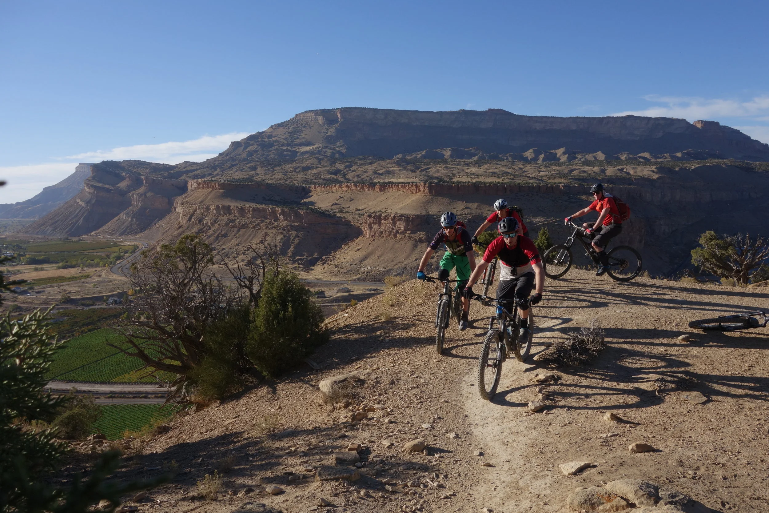 90 minutes of gentle climbing with stunning views and the odd steep technical section waiting to pitch you off the cliff when you clip a pedal on a rock or catch your shorts on the saddle.