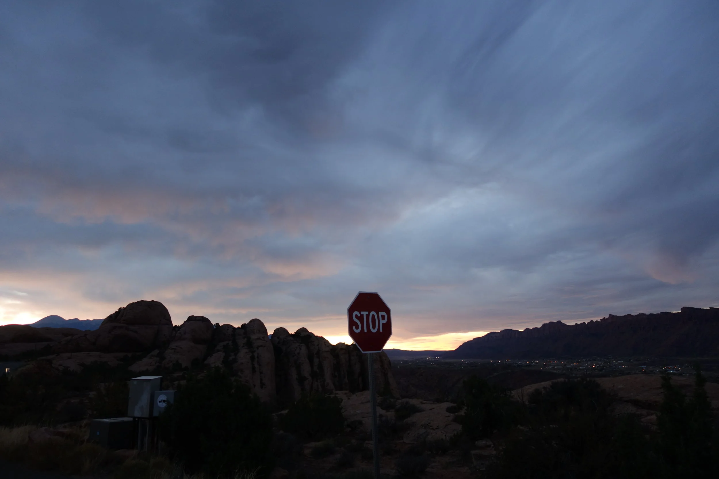Heading up the road at 7am and getting very excited. Moab lights in the distance. 