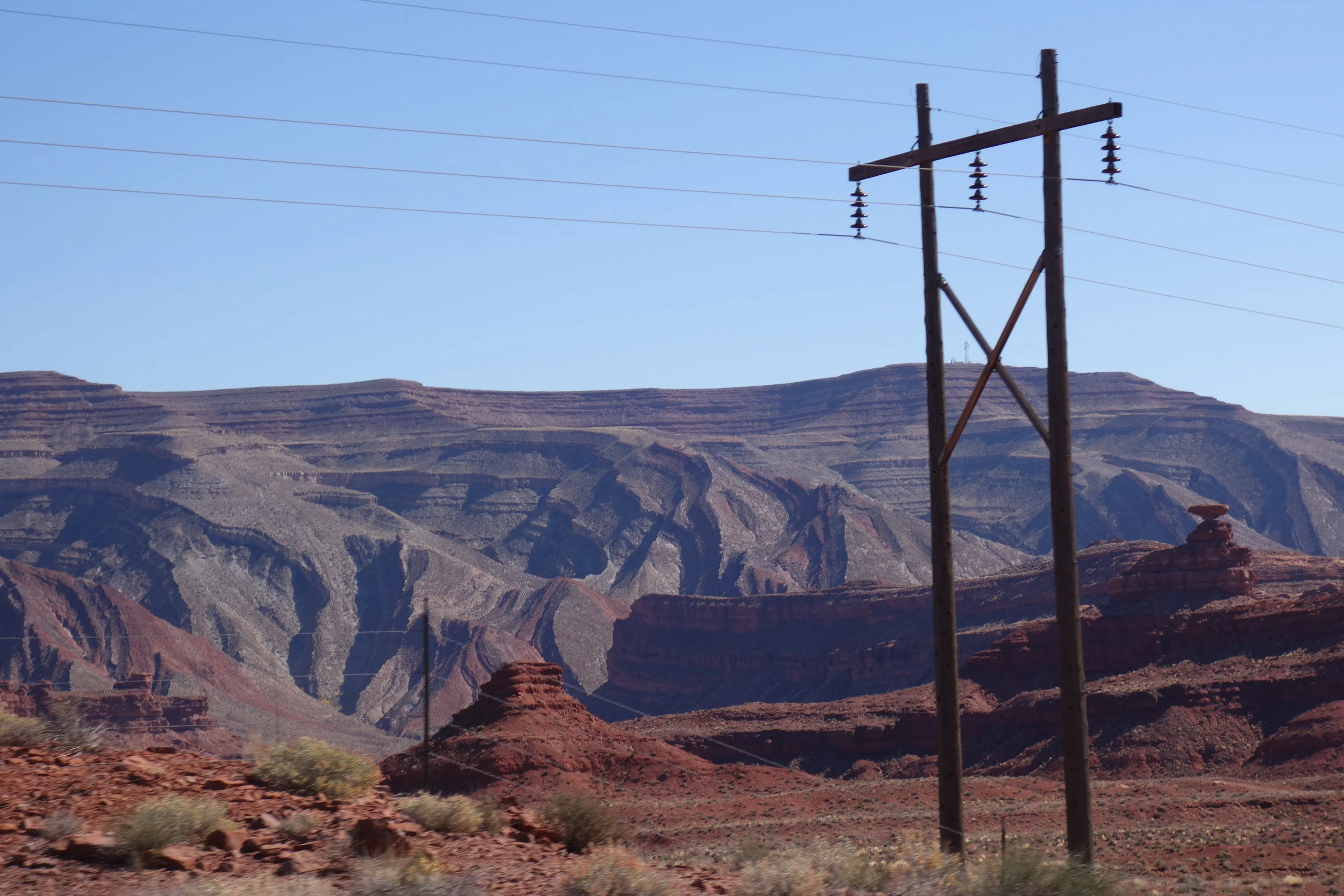 Check out that oval rock just right of the power pole balancing on it's pedestal