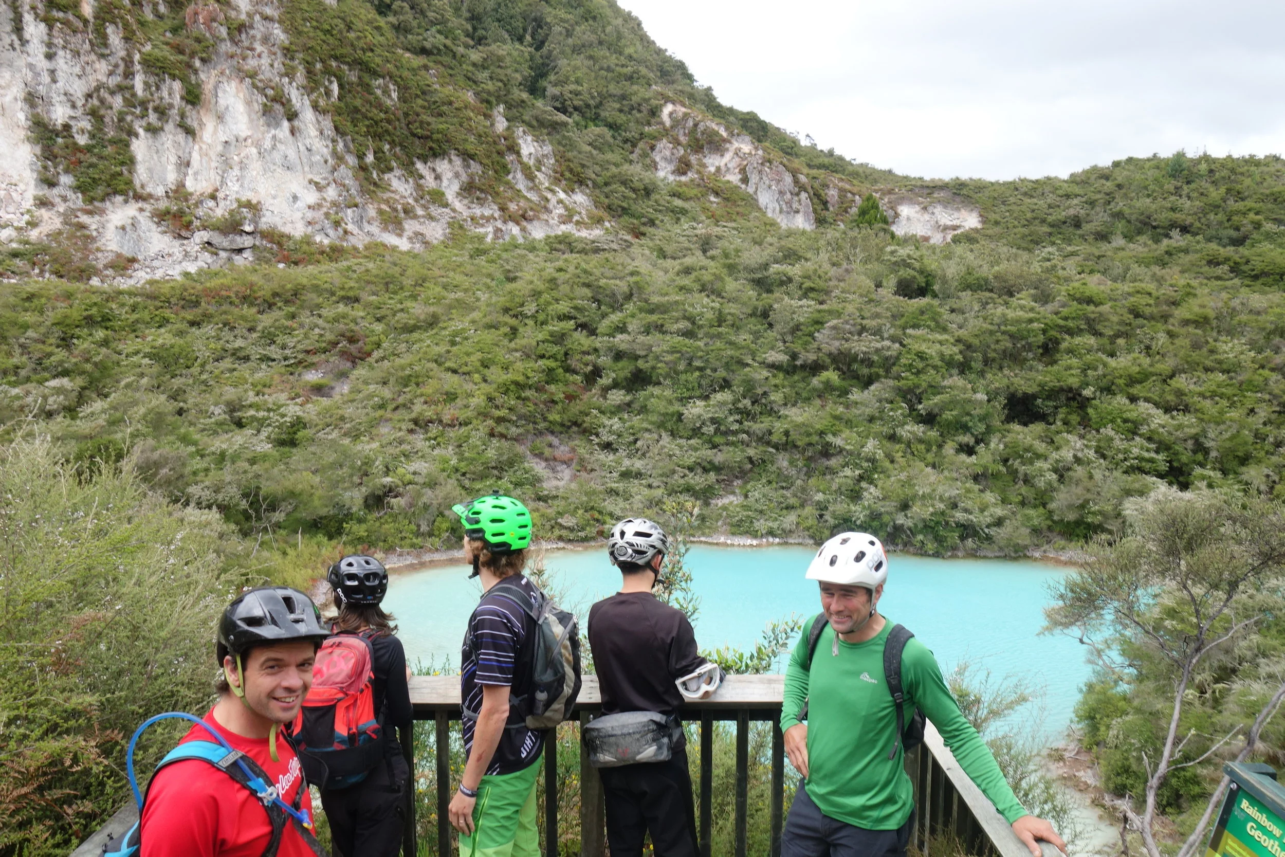 Local guide and cow farmer Mike Spanbroek (far right) begrudgingly lets us divert 30 metres to view the green lake on Rainbow mountain interrupting his training ride. Mike is arguably the fastest 50+ enduro racer in the country and wants to stay that way (I aim to push him off that perch and I'm prepared to get dirty).