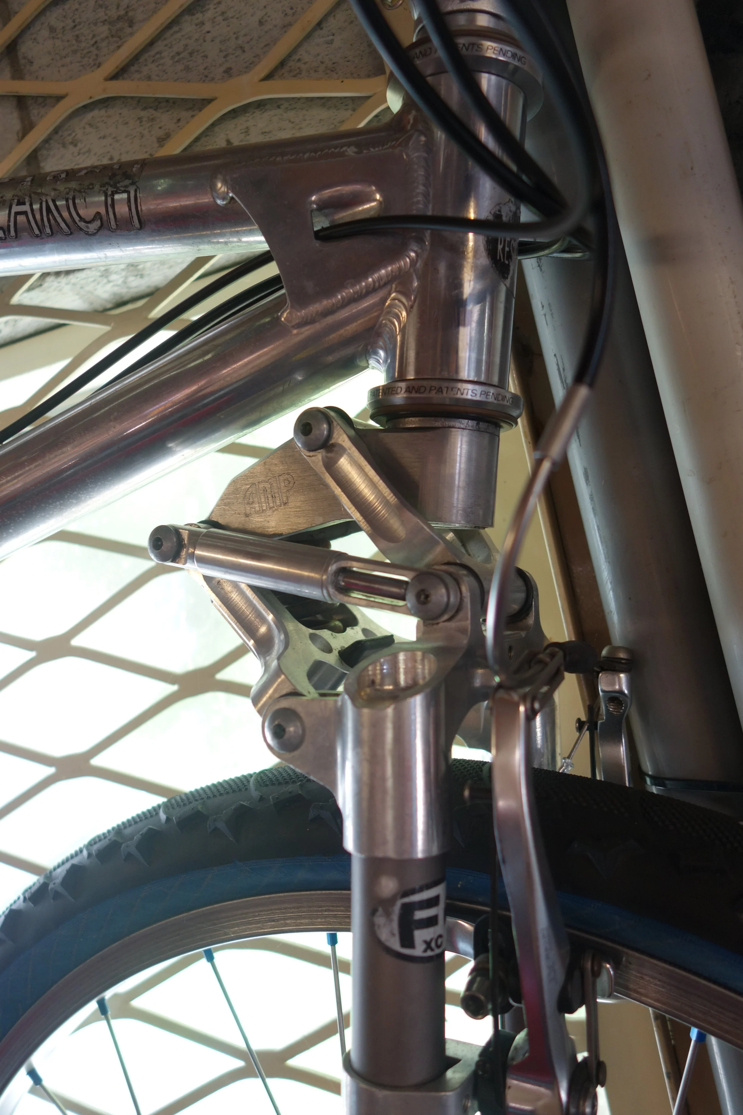 AMP had their own linkage fork which worked really well but wore the pivot bushings very quickly and it was impossible to get parts.