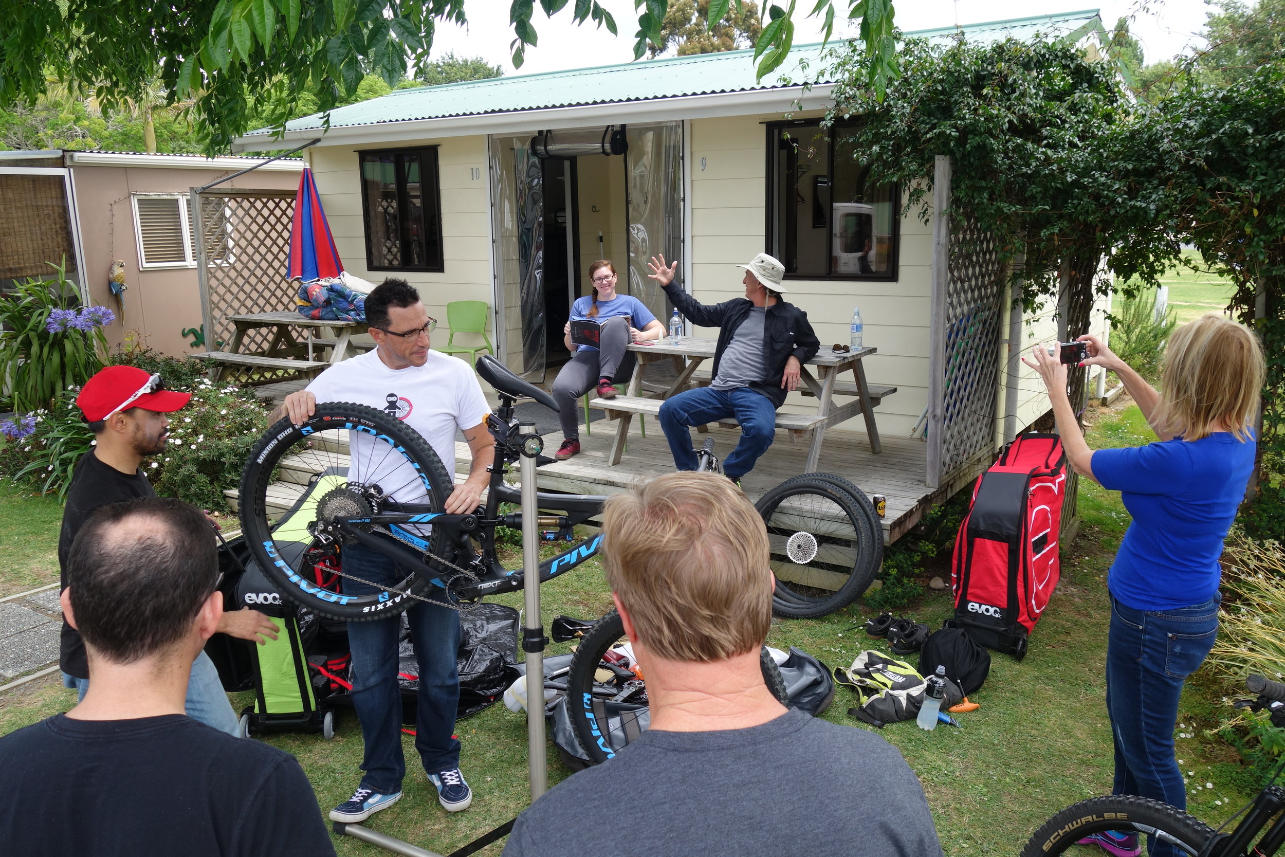 Bike assembly and briefing about the week to come. Orere Point Top 10 Holiday park. The Ninja Team clockwise from Jeff in the red cap. Jeff, Richard, Kristina, Mark, Patty, Jim and Mike.