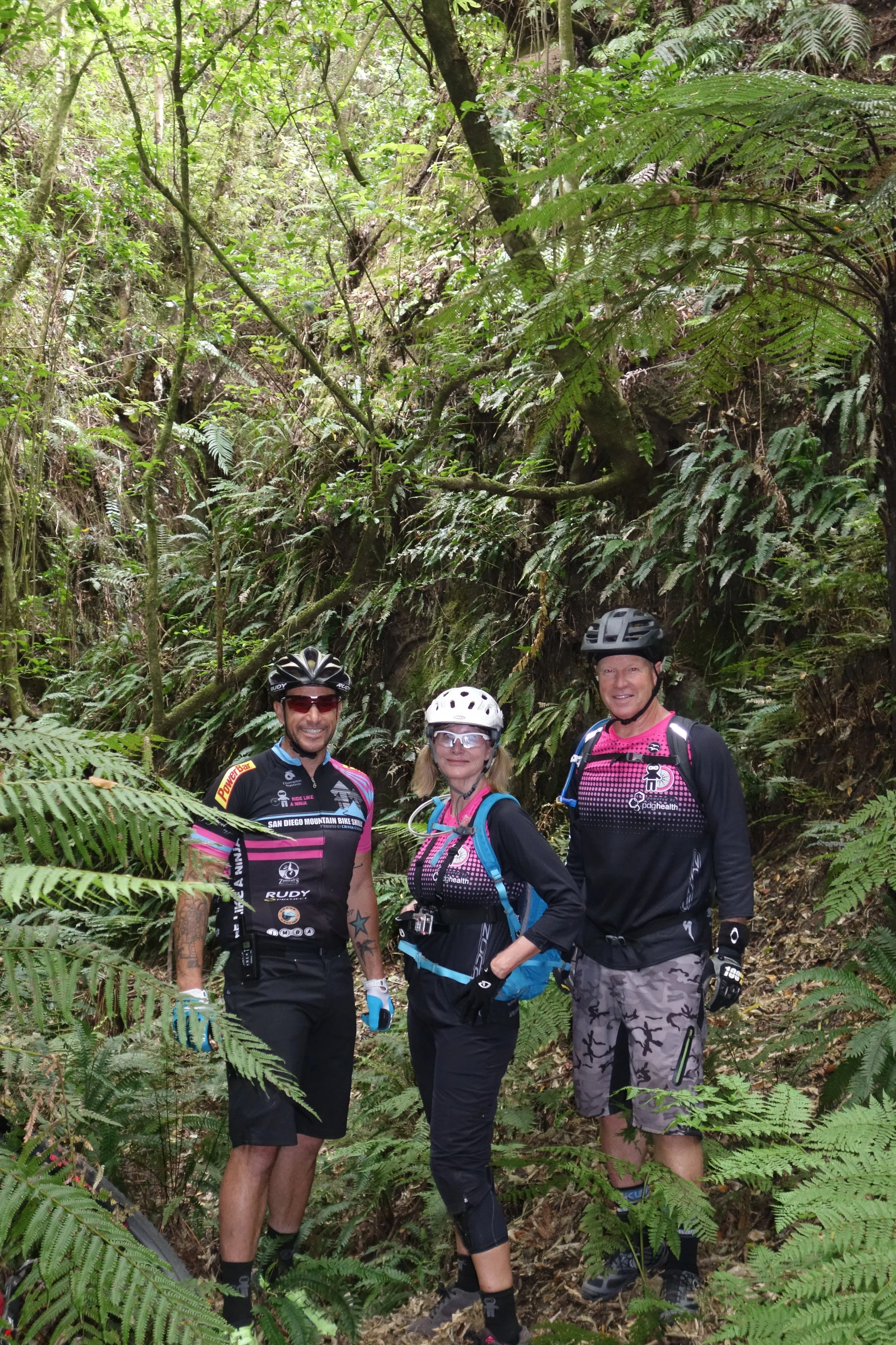Welcome to the jungle. Richard found a dark deep ravine off the side of the trail so Patty and Jim rode back to check it out.