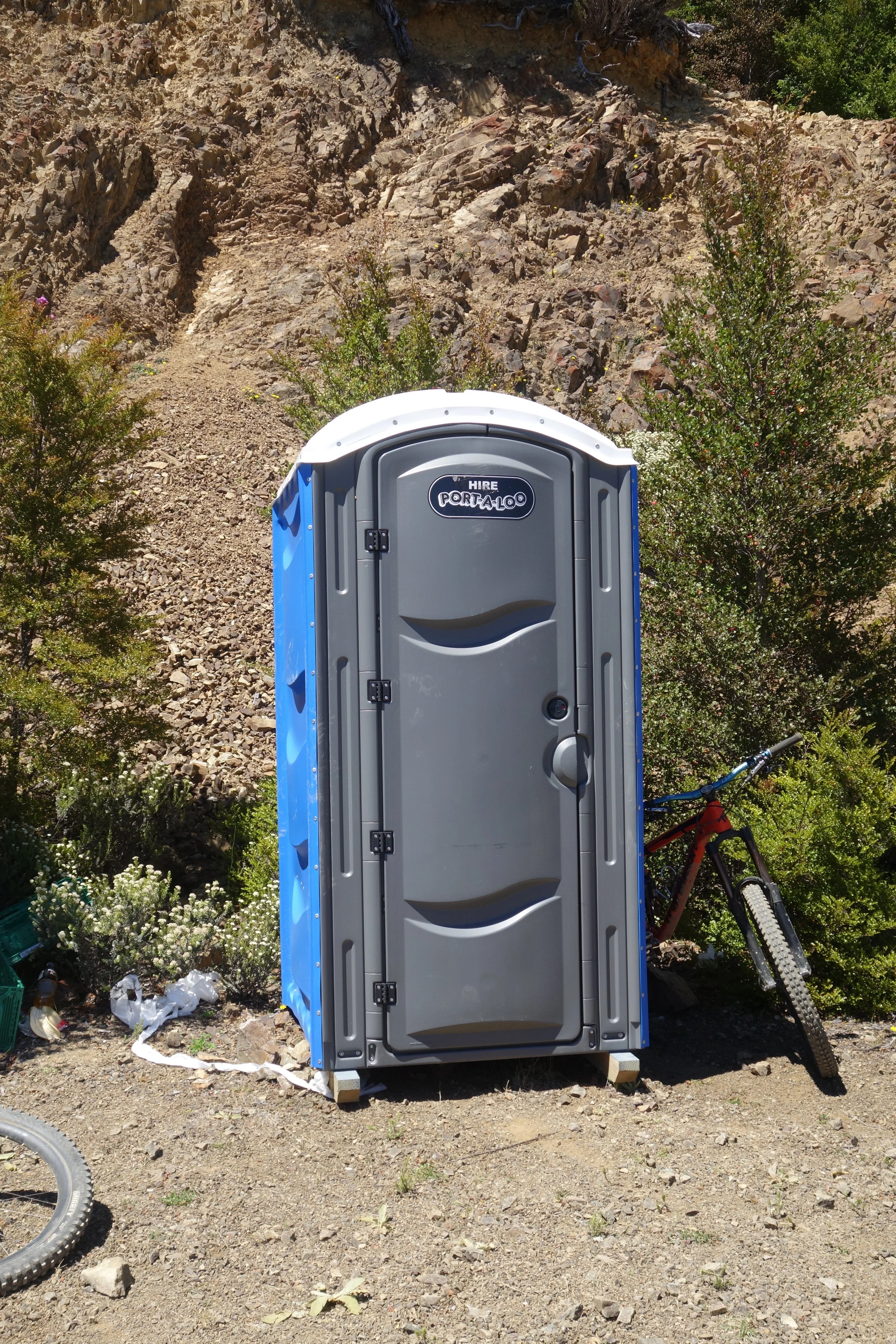 I just love visiting the Port-a-loo on a hot day. Especially when it's parked right where the shuttle drops of the riders. After race nerves jettisoned my lower intestine, I emerged to a queue of five girls about to be seriously nasally assaulted. Sorry girls.