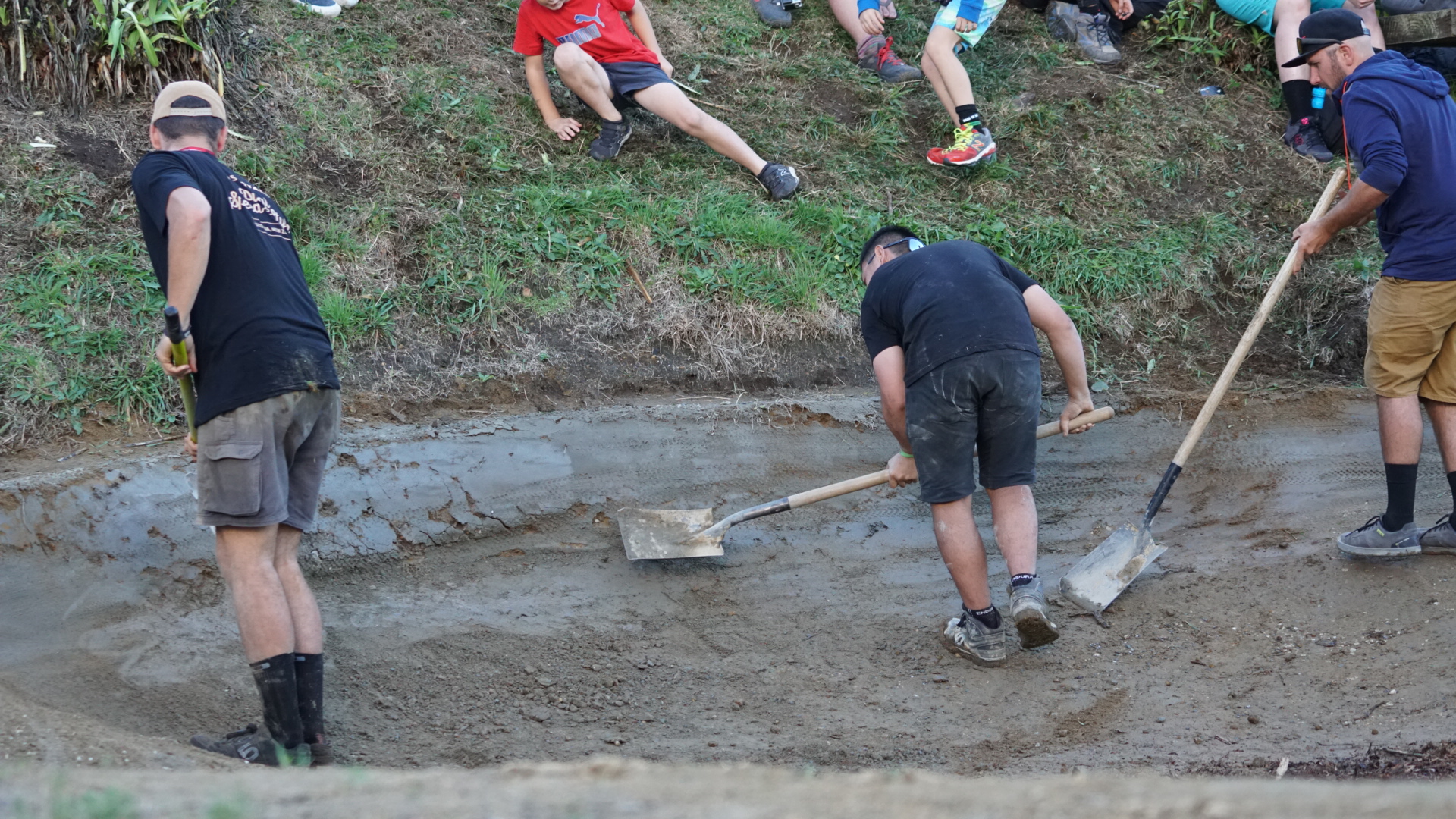 The lefthand tracks far end berm had more holes than therodfathers resume so the Empire of Dirt guys were kept busy repacking between runs. photo: Jeff Carter.