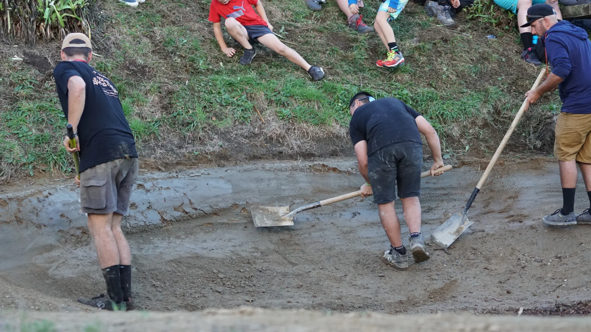 The lefthand tracks far end berm had more holes than therodfathers resume so the Empire of Dirt guys were kept busy repacking between runs. photo: Jeff Carter.