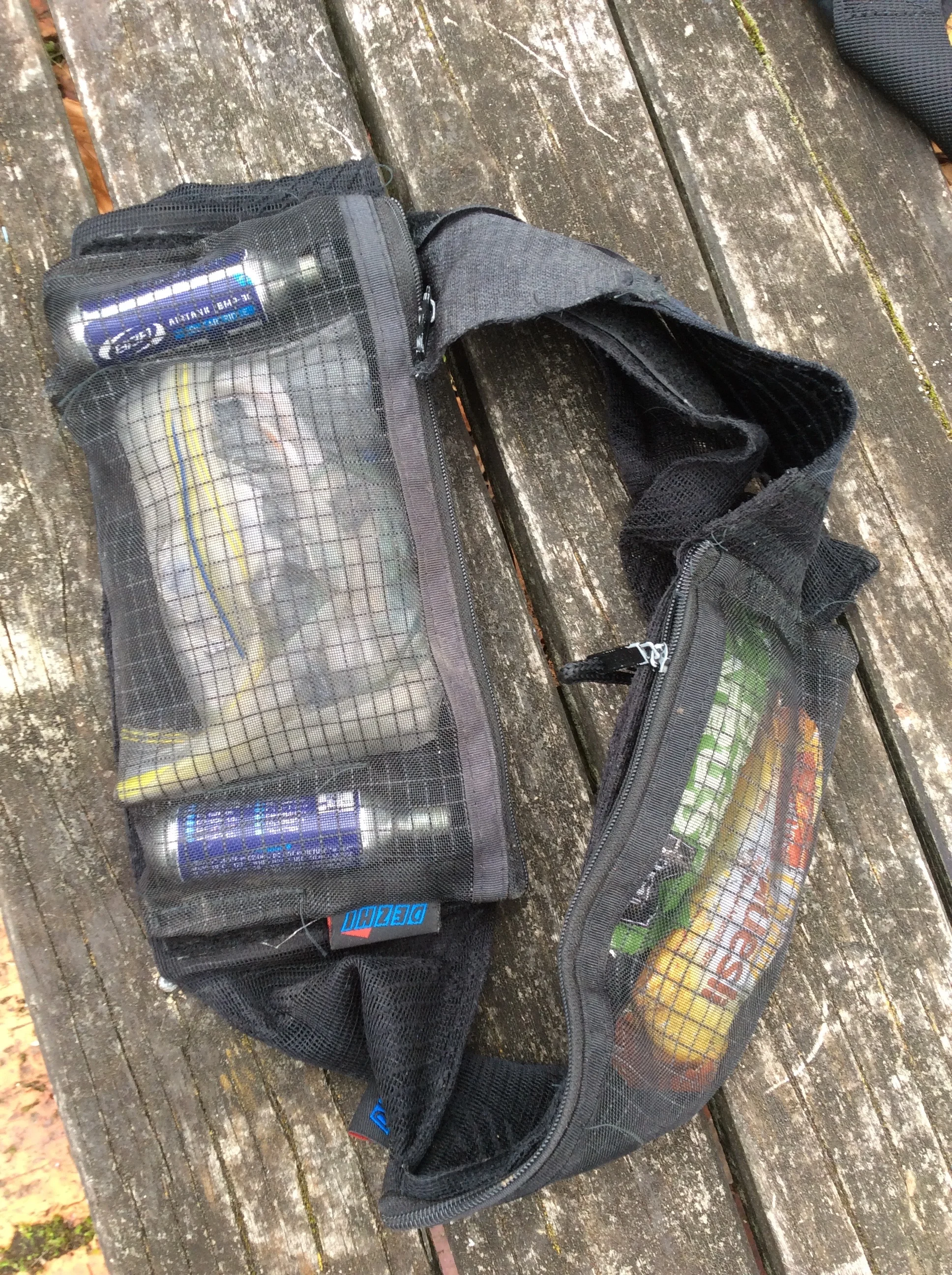 The main velcro removable zippered unit held all my shit for trailside repairs and the front one my sugar stash. The Batman and me are like homies now.