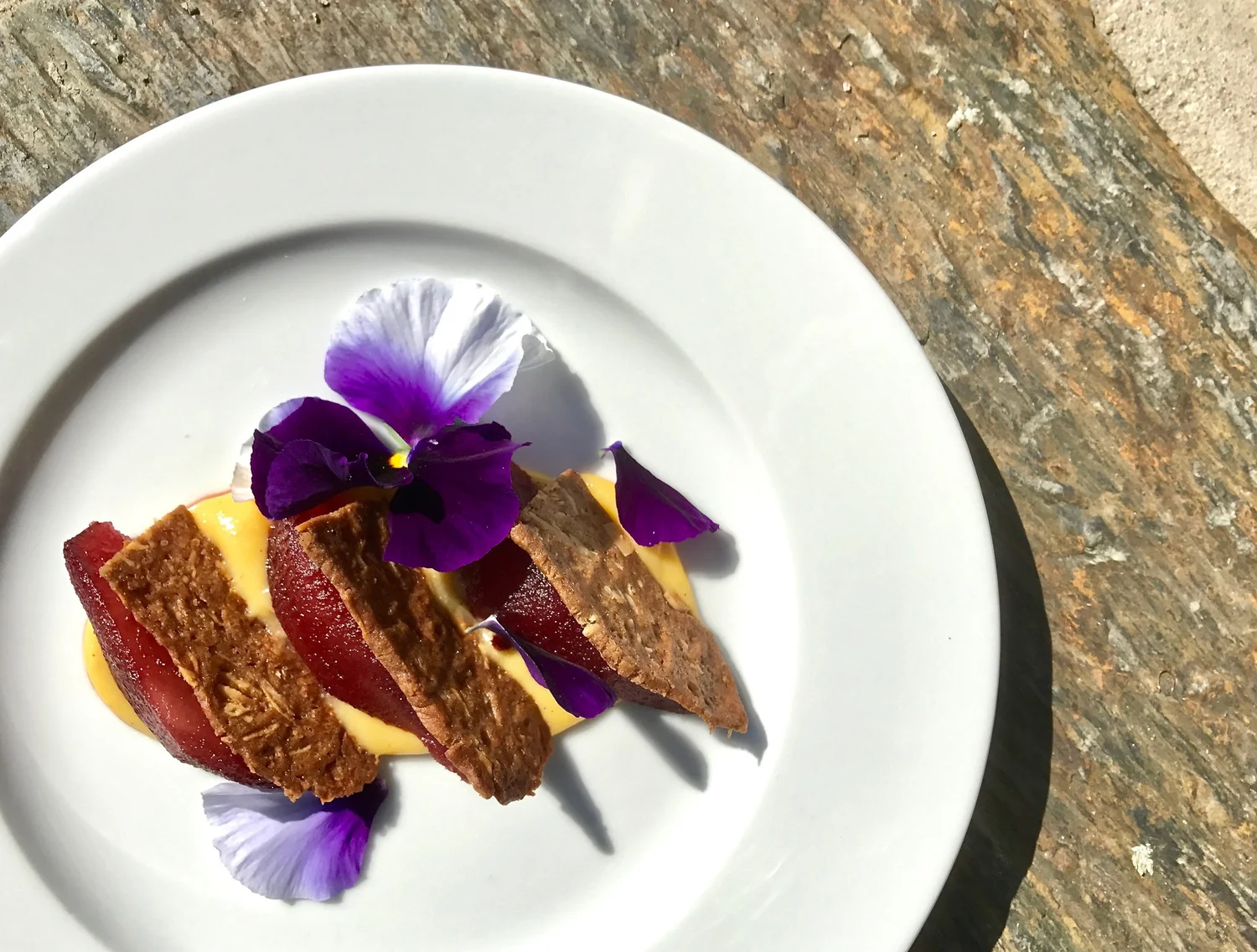  Ruby-poached pears, Kay’s spice cookies, orange-vanilla cream. 