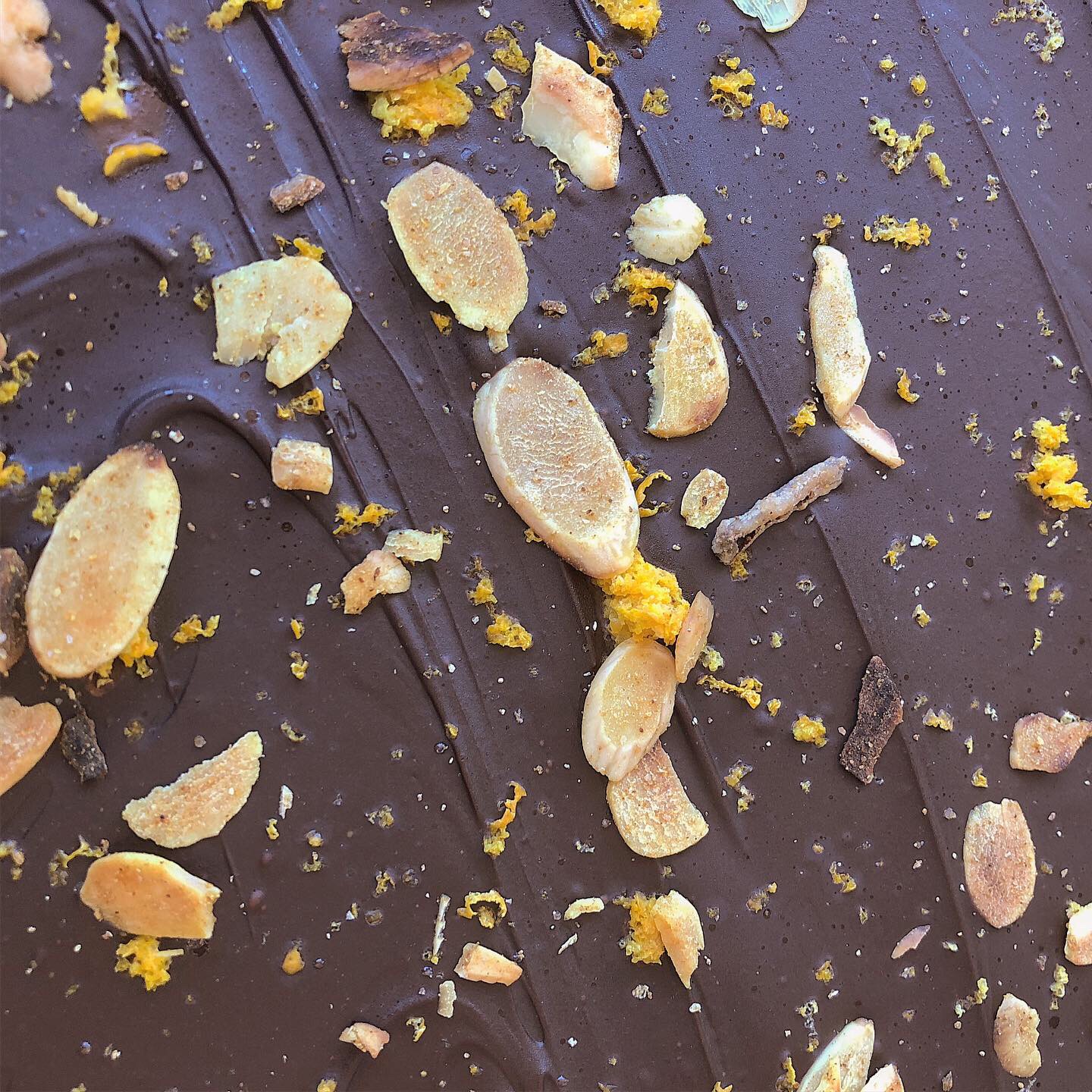  Toasted almonds and orange peel milk chocolate pairs with our Fine Tawny. 