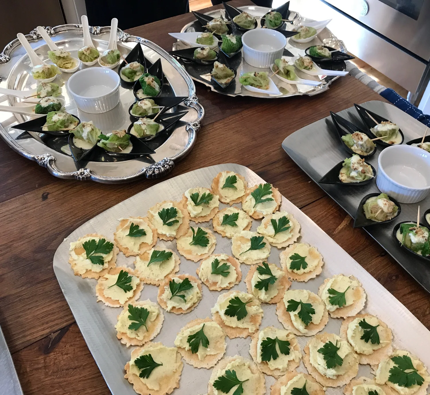 Brandade on crackers and bite-sized chestnut-stuffed cabbage leaves with a Serra de Estrela cheese sauce.
