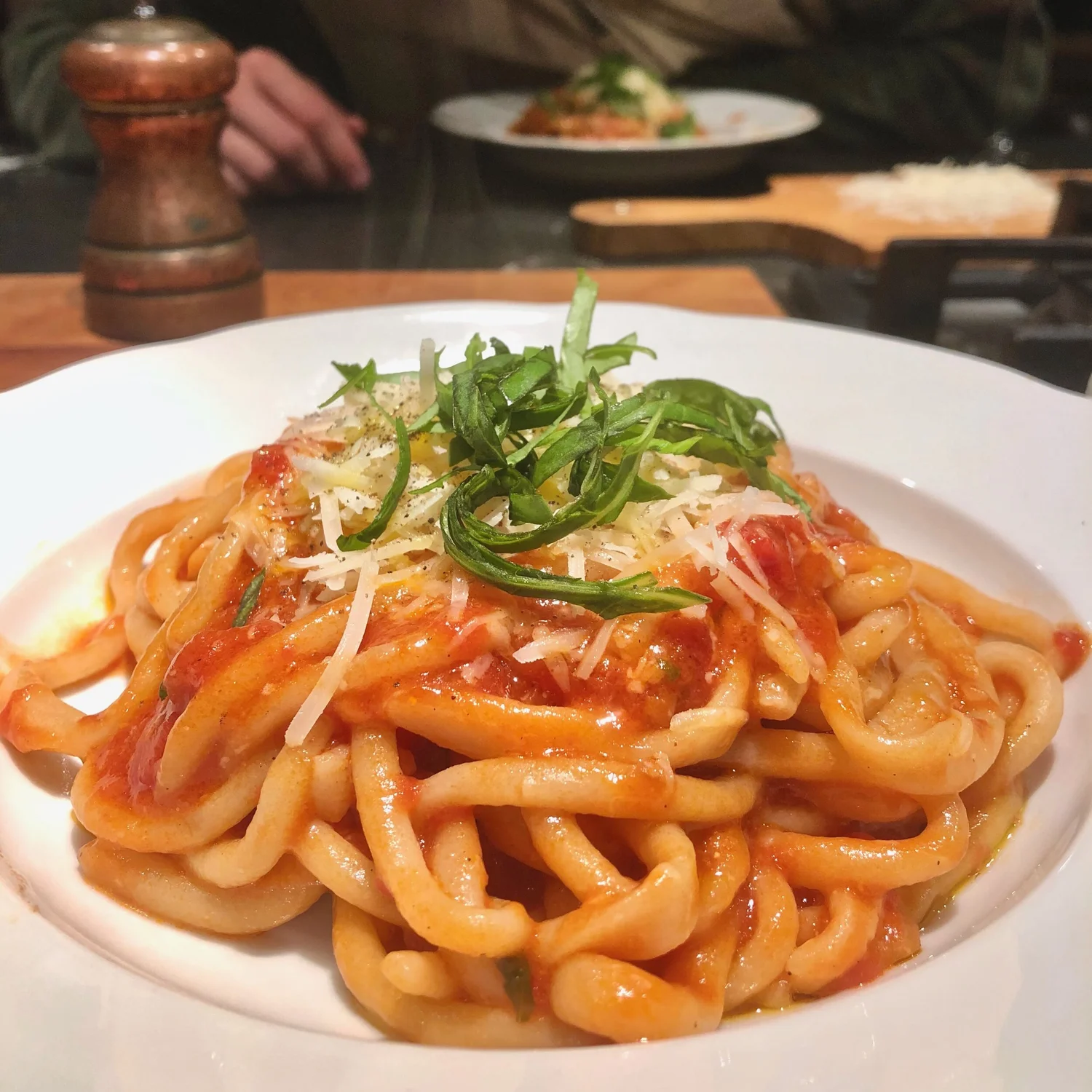   … and onto your plate, preferably over homemade pici pasta and tomato sauce…  