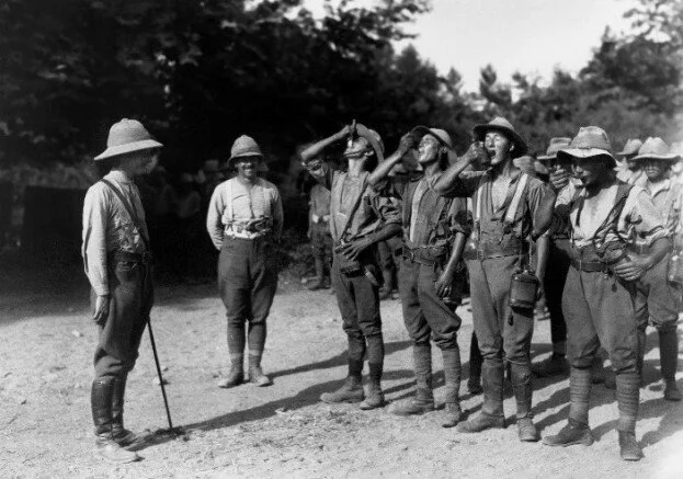 English troops in India taking their daily dose of Quinine to prevent malaria.